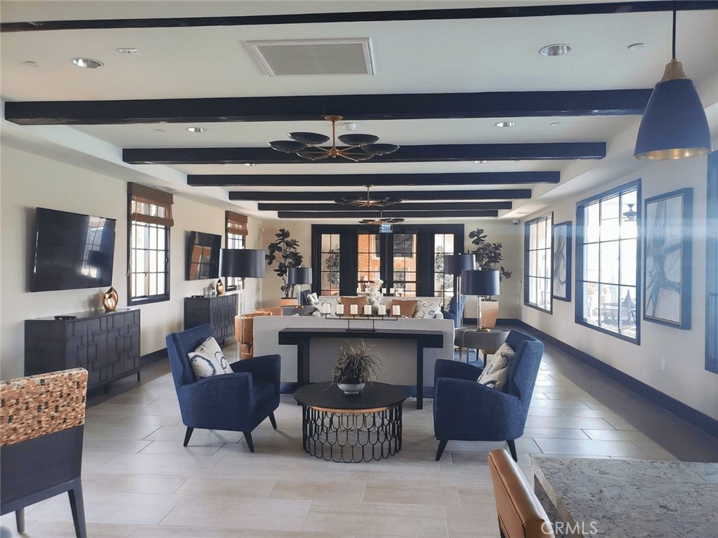 39995 Alba Way Palm Desert, CA 92211 - Photo 38 of 44 a living room with furniture and flat screen tv