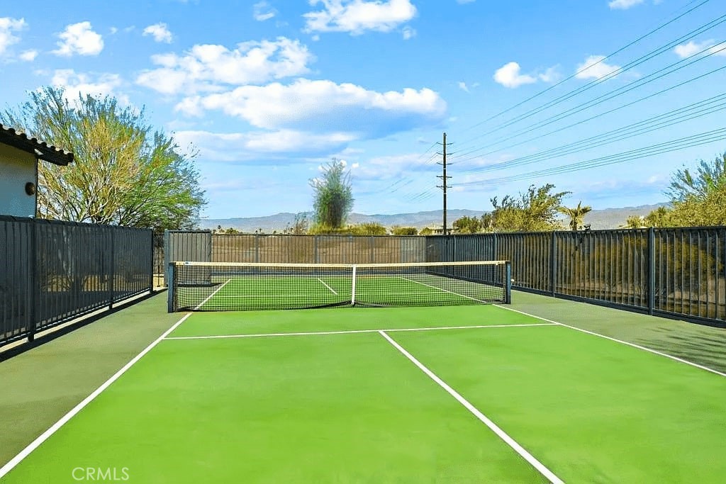 39995 Alba Way Palm Desert, CA 92211 - Photo 41 of 44 a view of an outdoor space and tennis court