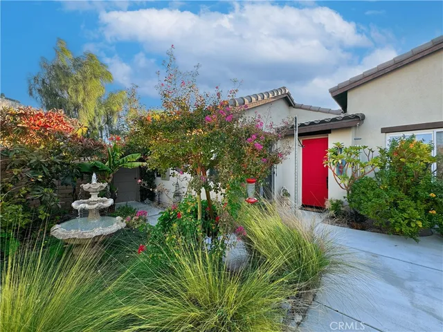 a view of living room with furniture and a rug