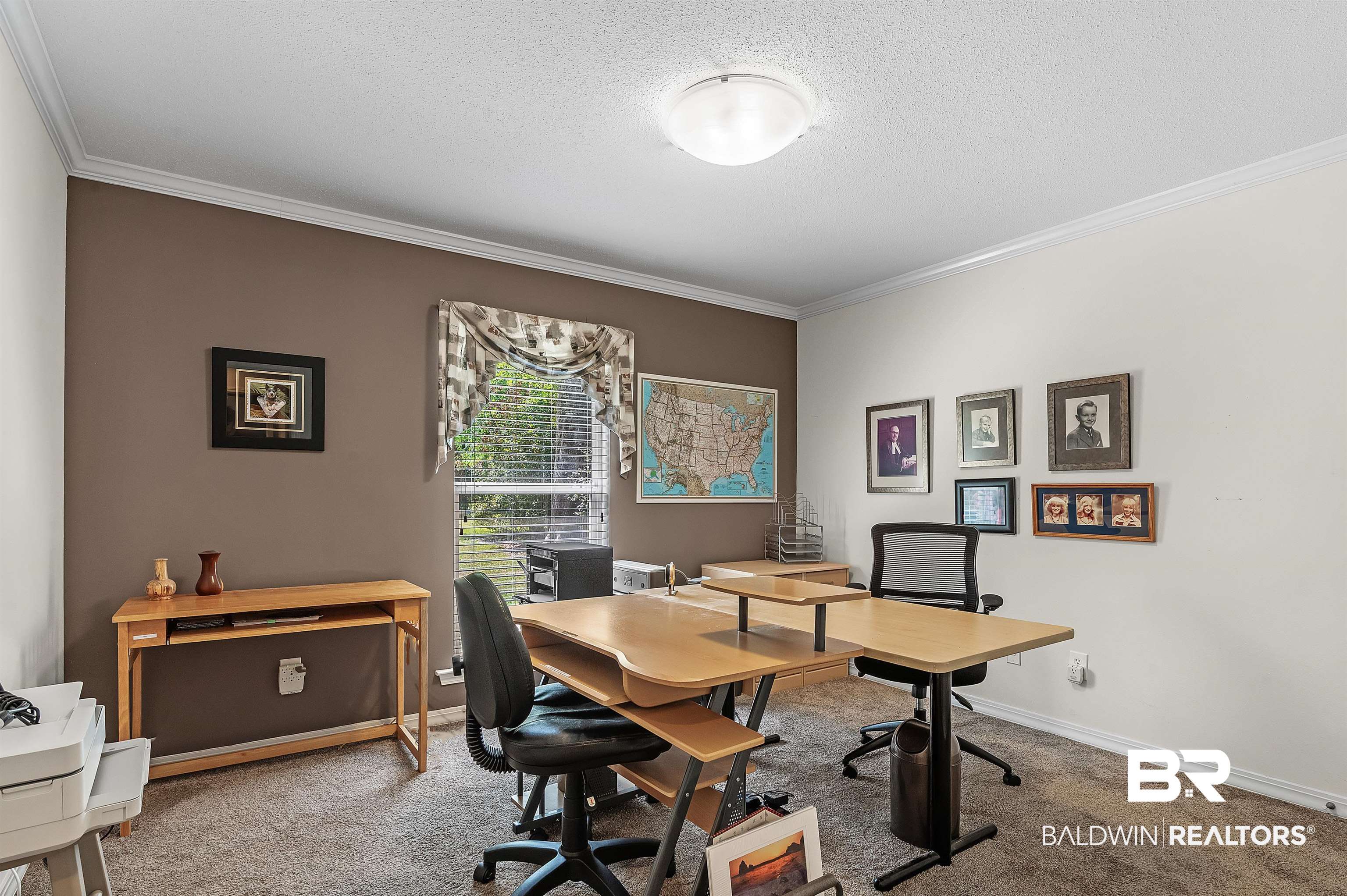 9908 Clarke Ridge Road Foley, AL 36535 - Photo 50 of 56 Office area with baseboards, a textured ceiling, crown molding, and carpet