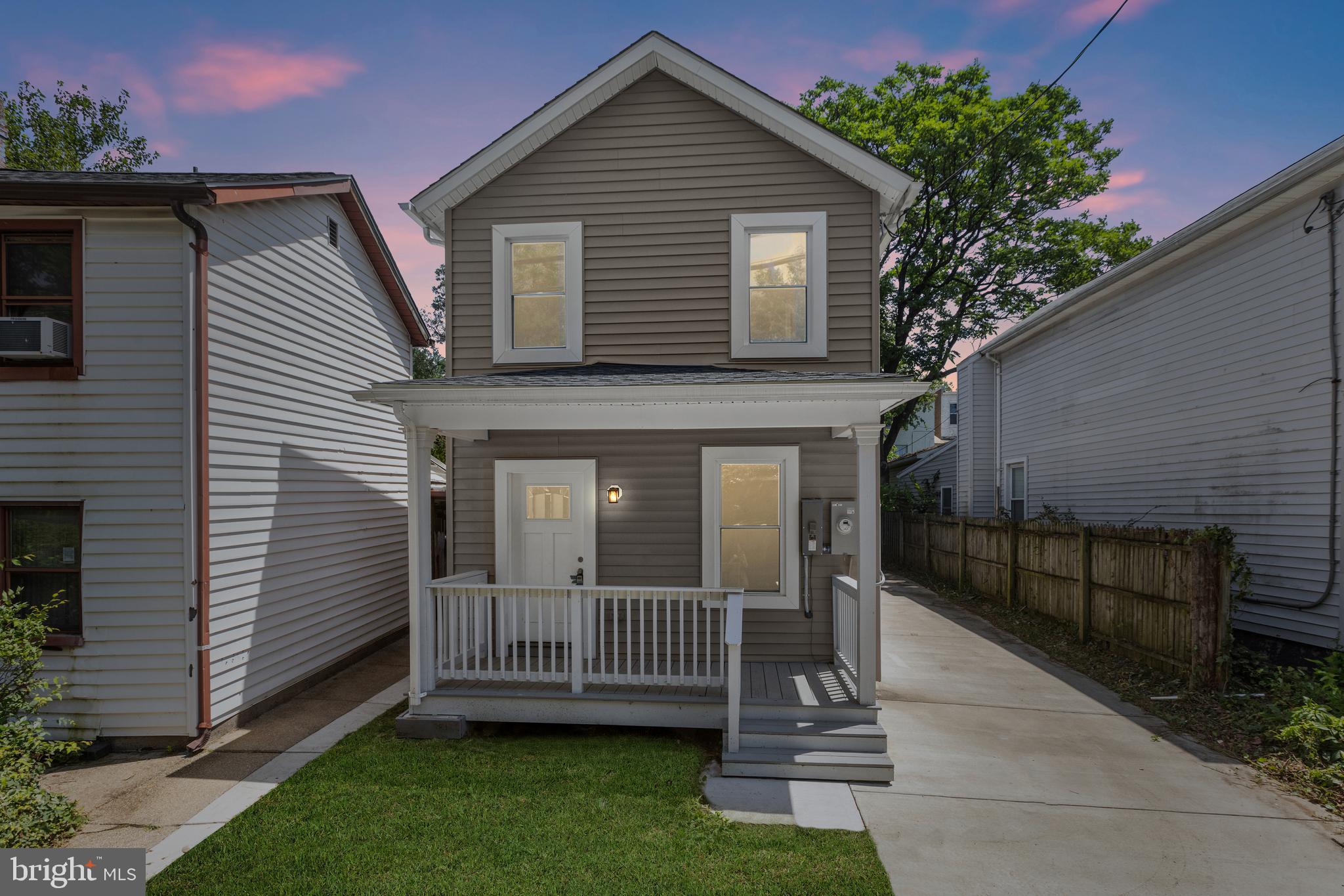 4015 Evans Chapel Road Baltimore, MD 21211 - Photo 2 of 50 a view of a house with a yard
