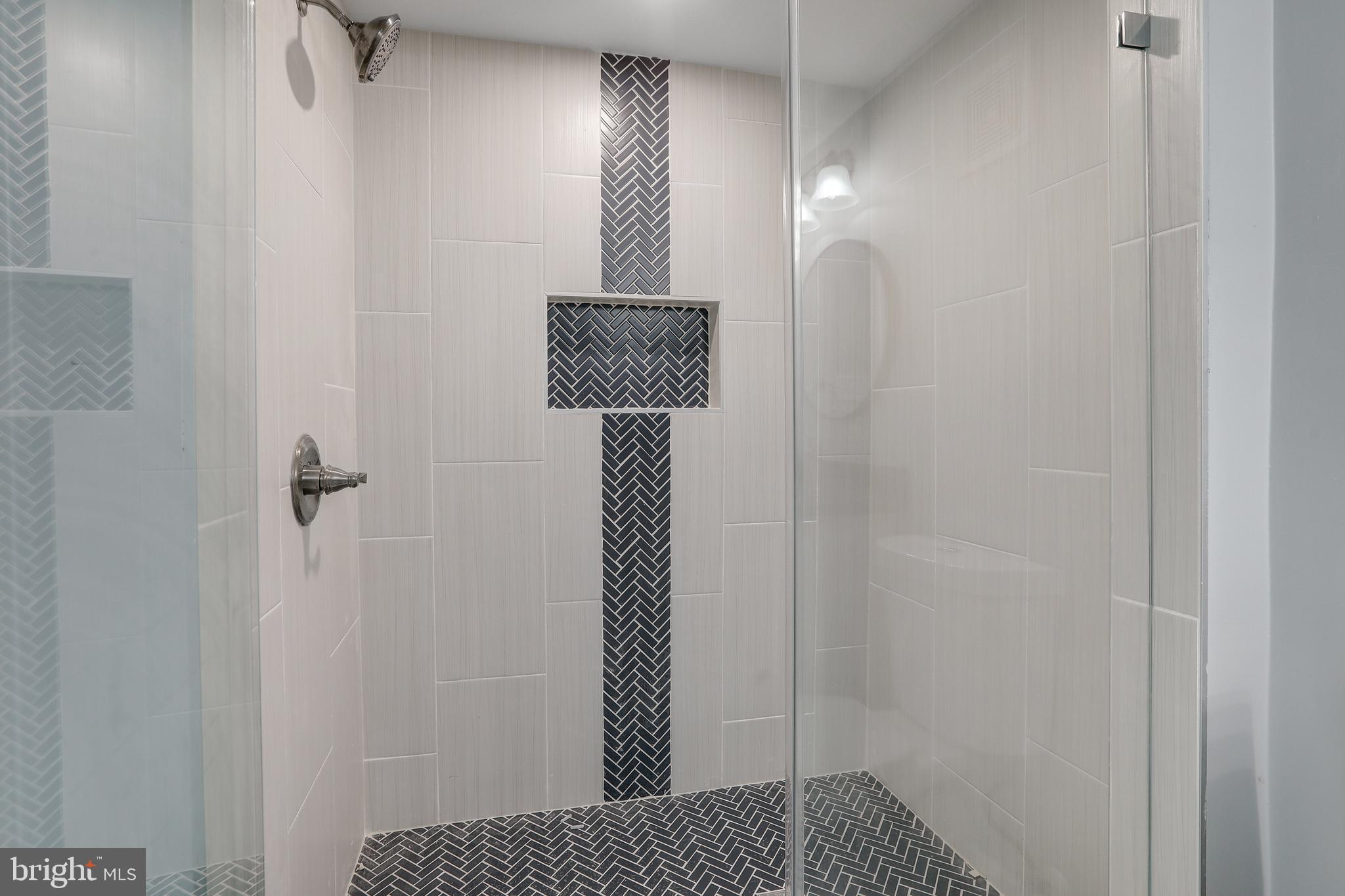4015 Evans Chapel Road Baltimore, MD 21211 - Photo 31 of 50 a bathroom with a shower