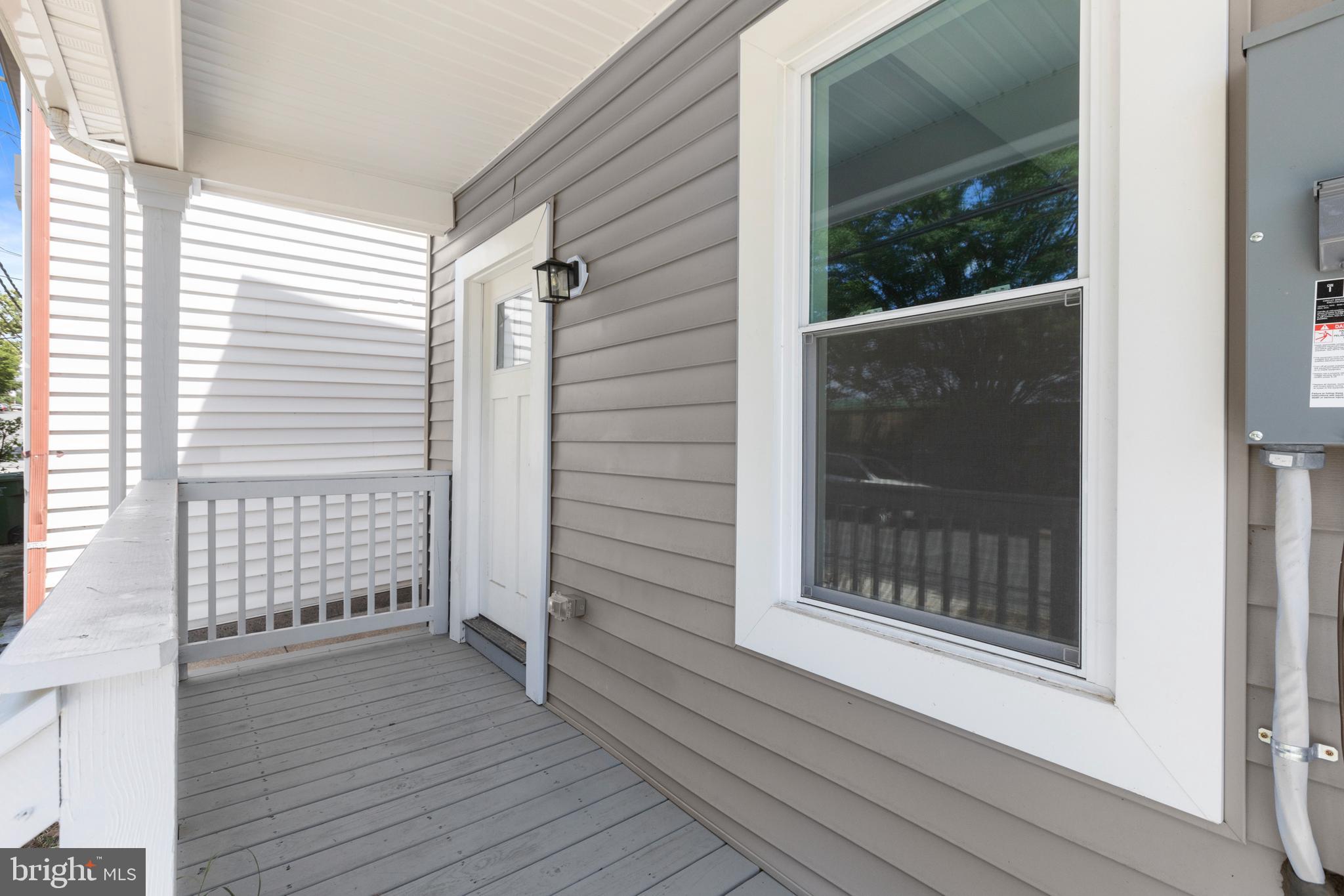 4015 Evans Chapel Road Baltimore, MD 21211 - Photo 5 of 50 a view of outdoor space with deck and windows