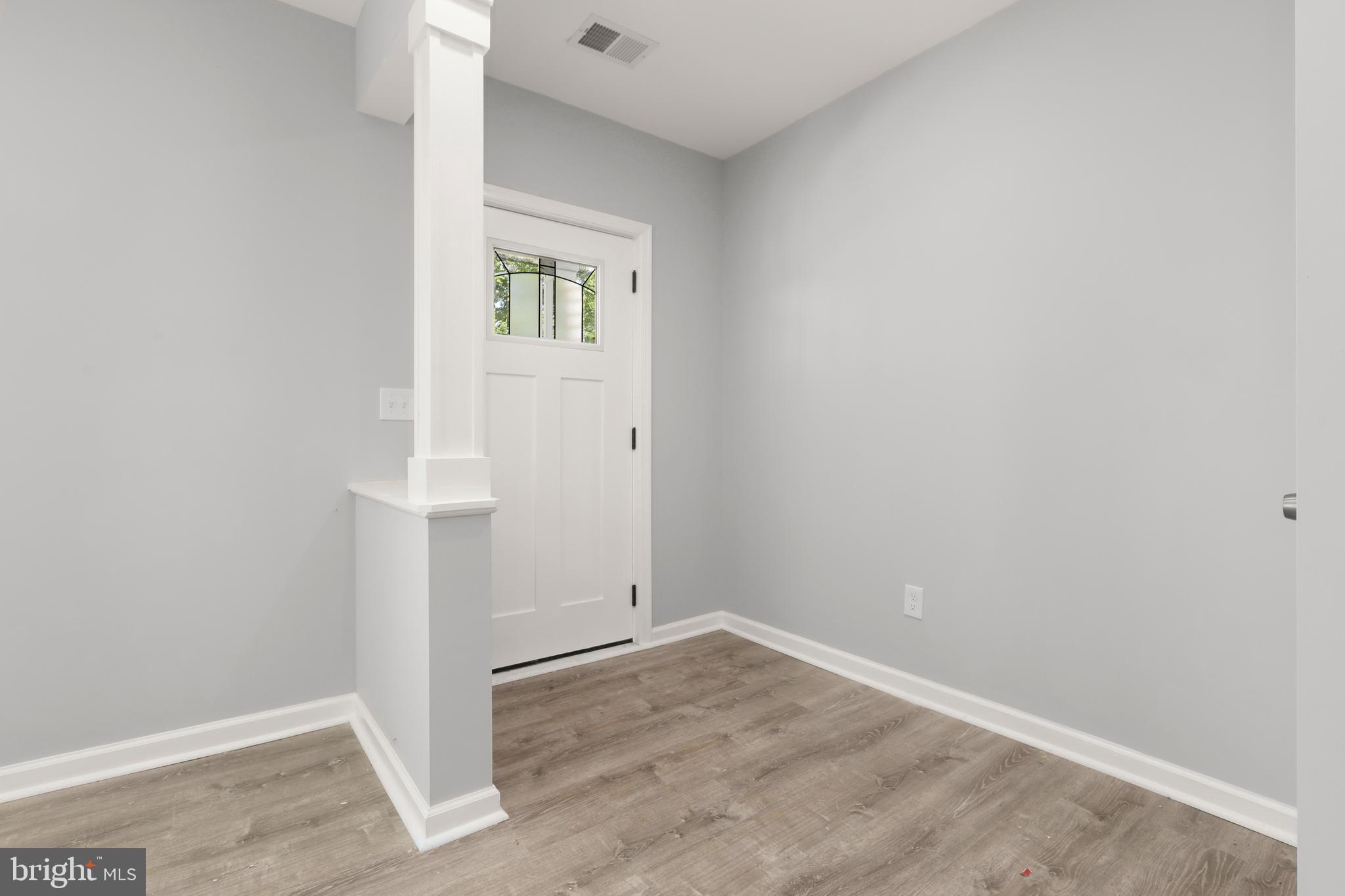 4015 Evans Chapel Road Baltimore, MD 21211 - Photo 6 of 50 an empty room with a window