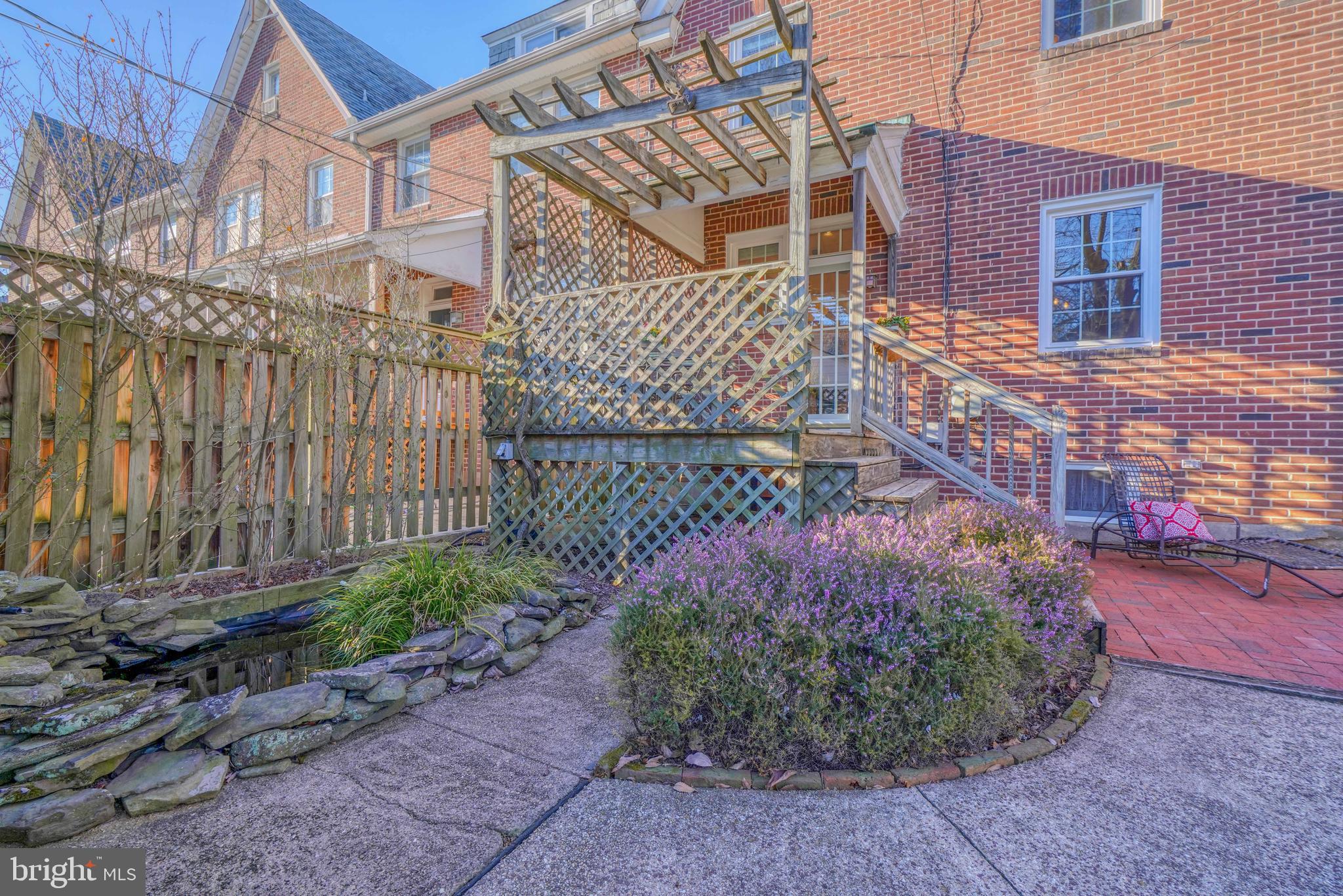 209 Hopkins Road Baltimore, MD 21212 - Photo 14 of 78 Delightful fish pond w/stone setting