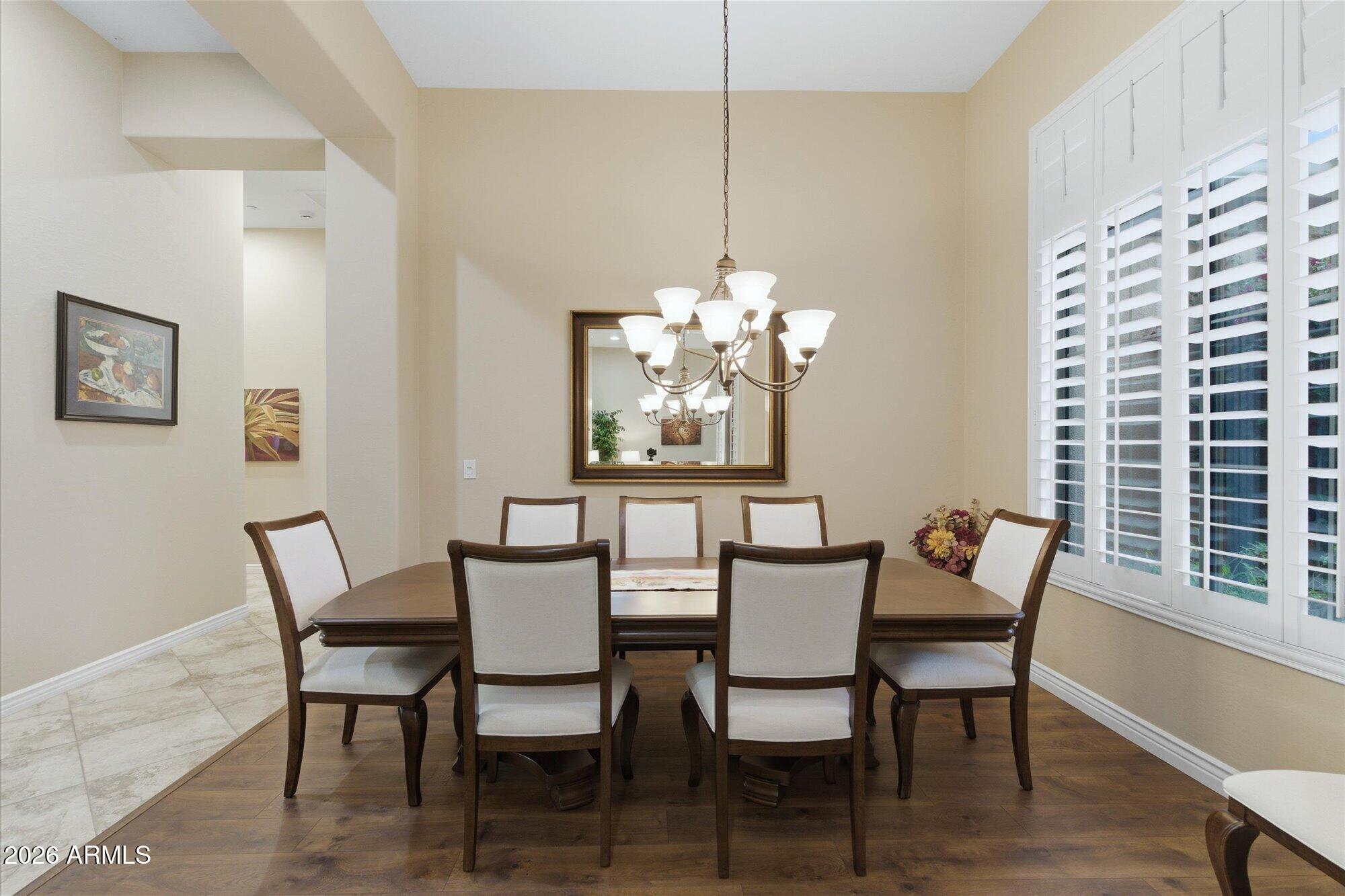 40322 North Hawk Ridge Trail Anthem, AZ 85086 - Photo 12 of 63 a view of a dining room with furniture window and outside view