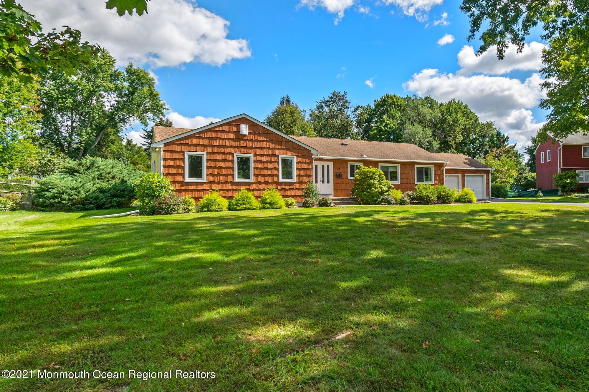 36 Coldspring Road Freehold, NJ 07728 - Photo 2 of 37 a front view of a house with a garden