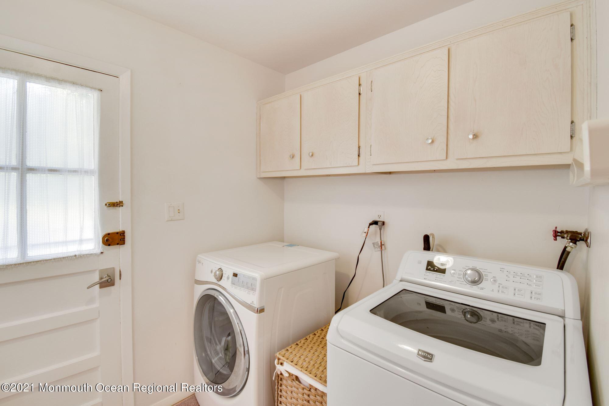 36 Coldspring Road Freehold, NJ 07728 - Photo 16 of 37 a utility room with dryer and washer