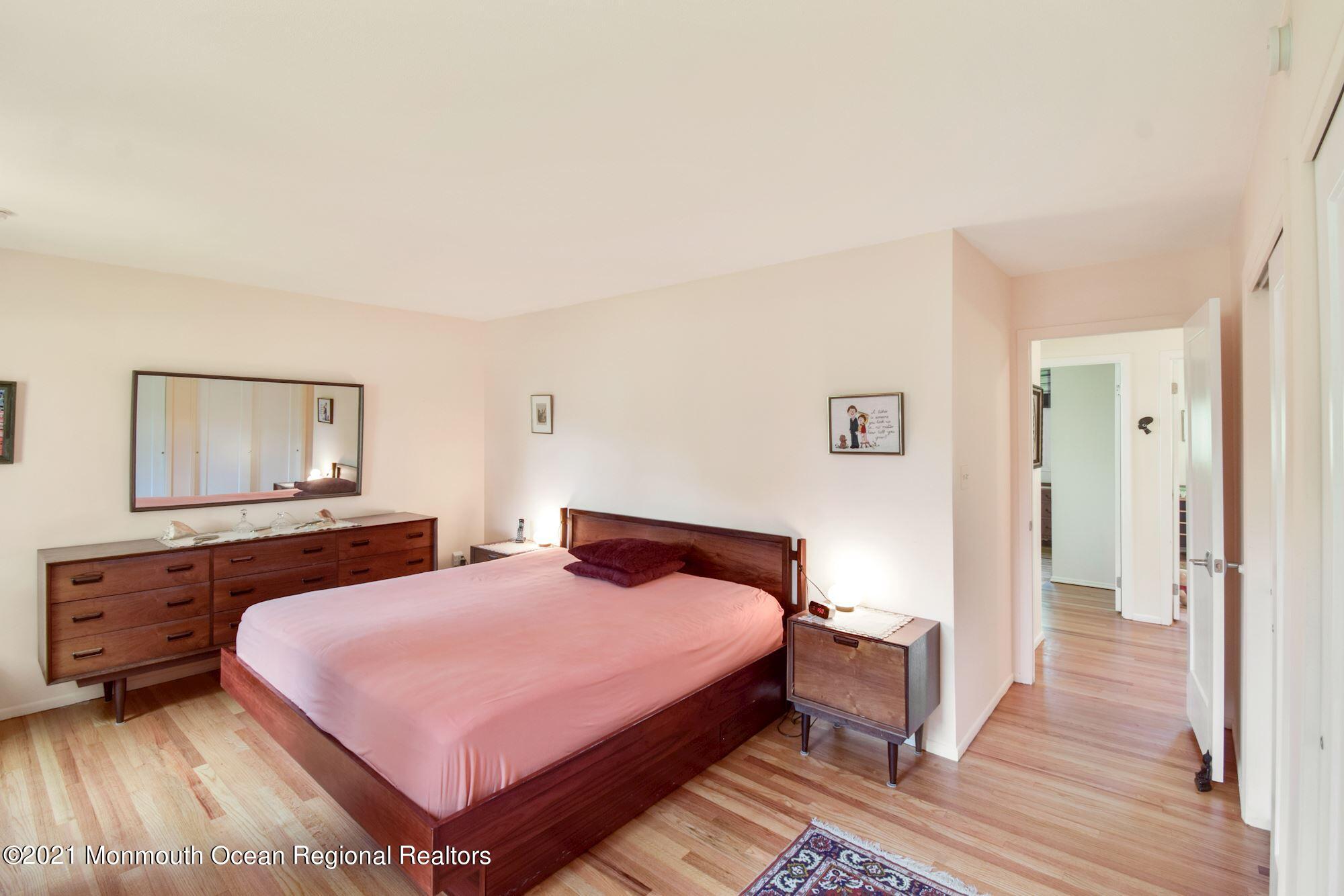 36 Coldspring Road Freehold, NJ 07728 - Photo 18 of 37 a bedroom with two beds and painting on the wall