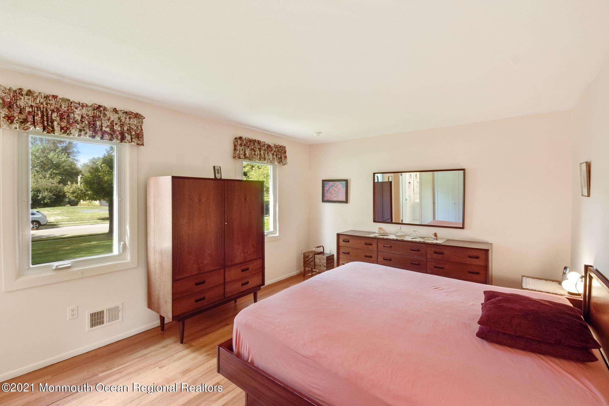 36 Coldspring Road Freehold, NJ 07728 - Photo 19 of 37 a bedroom with a bed and a dresser