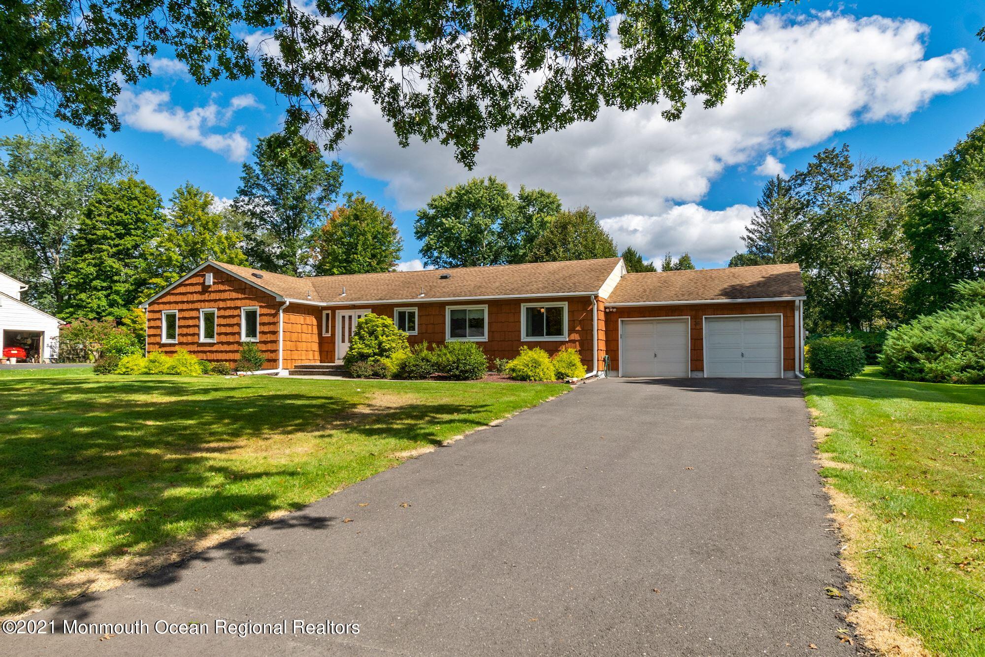 36 Coldspring Road Freehold, NJ 07728 - Photo 3 of 37 a front view of house with yard and green space