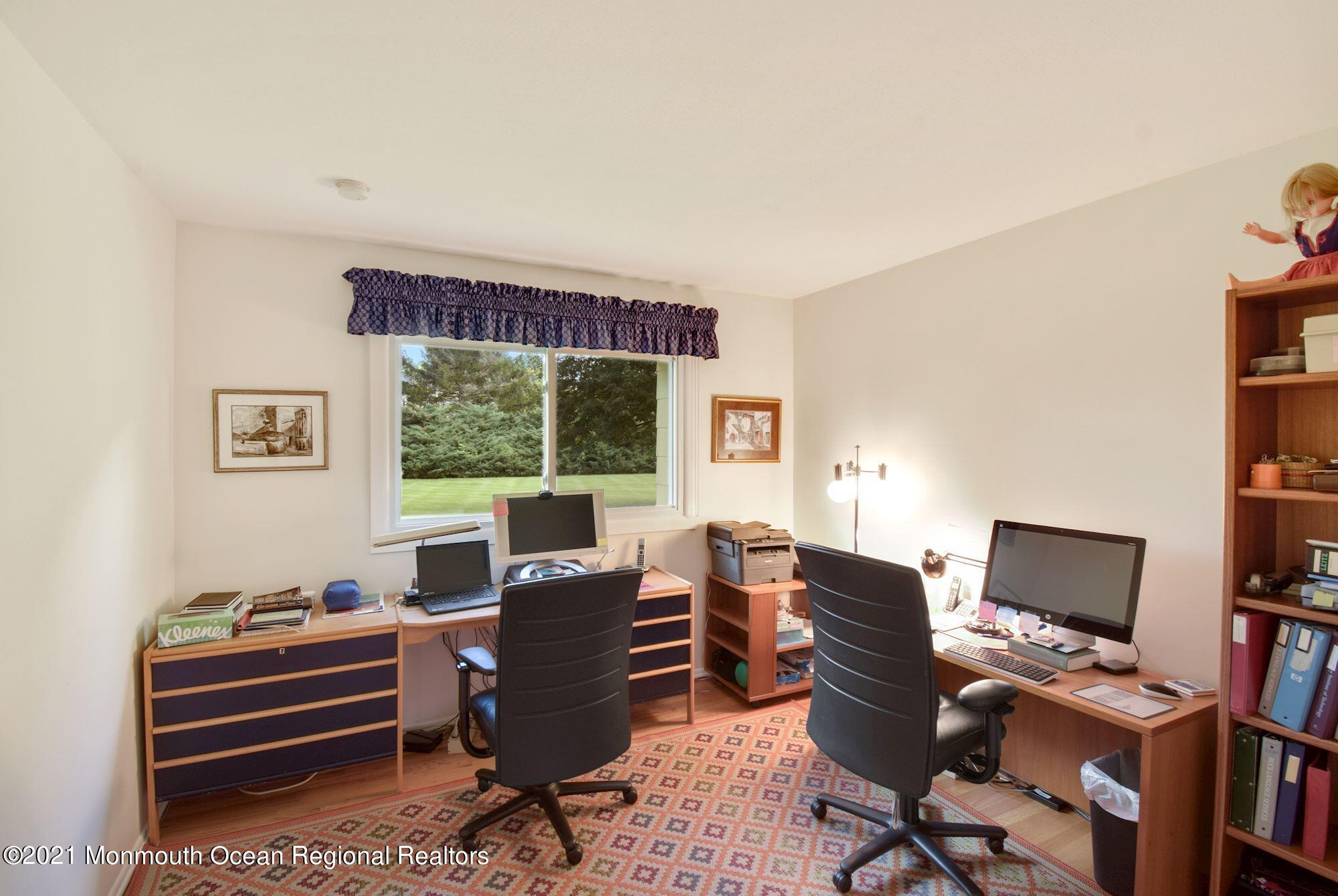 36 Coldspring Road Freehold, NJ 07728 - Photo 22 of 37 a view of a workspace with furniture and a window
