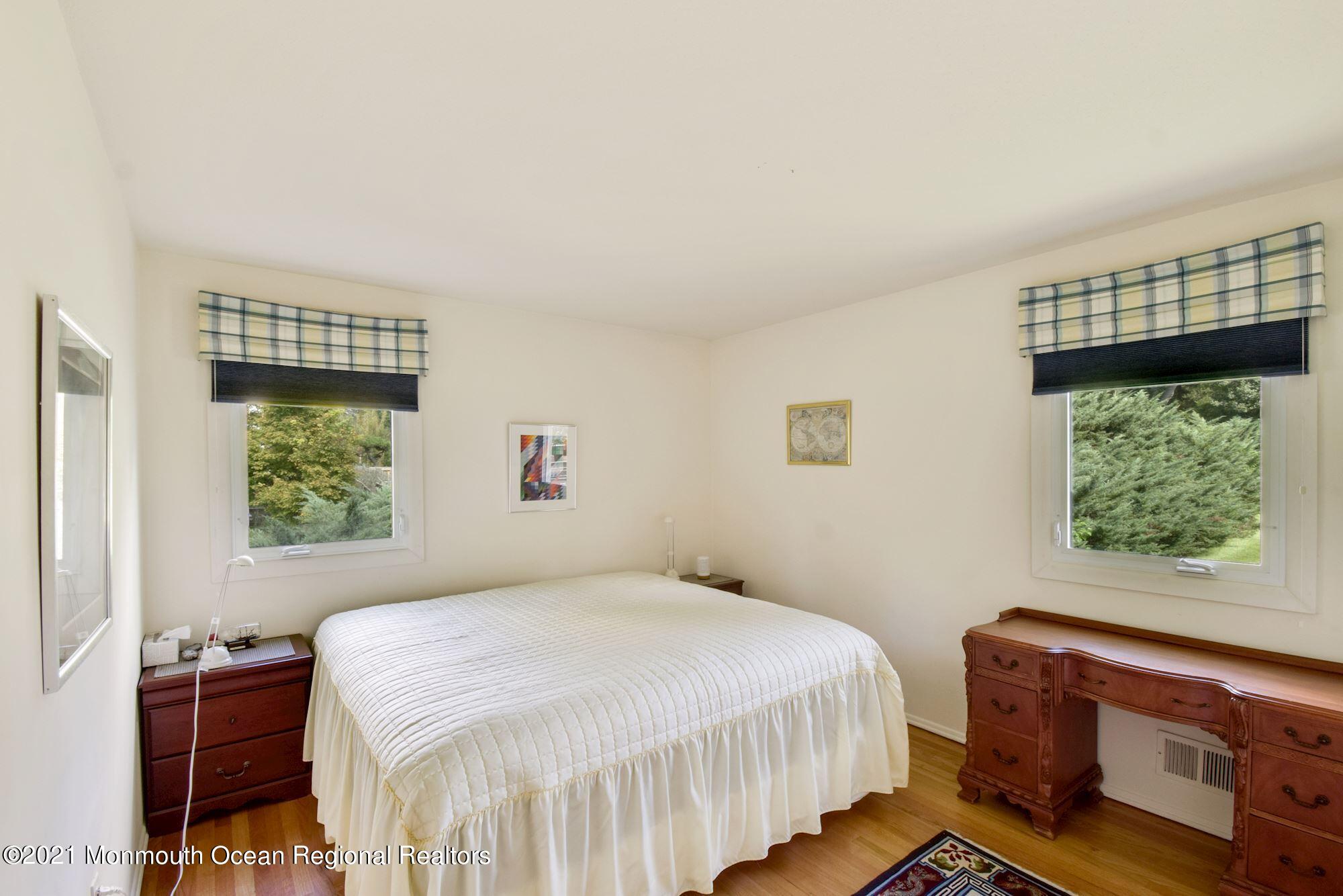 36 Coldspring Road Freehold, NJ 07728 - Photo 23 of 37 a bedroom with a bed and a window