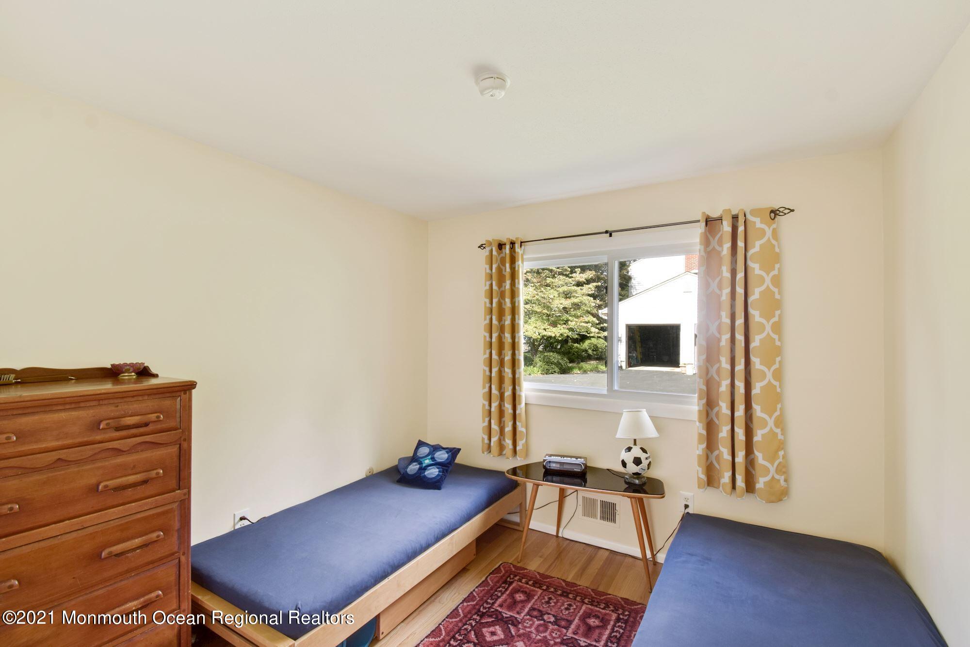 36 Coldspring Road Freehold, NJ 07728 - Photo 24 of 37 a room with furniture and a window