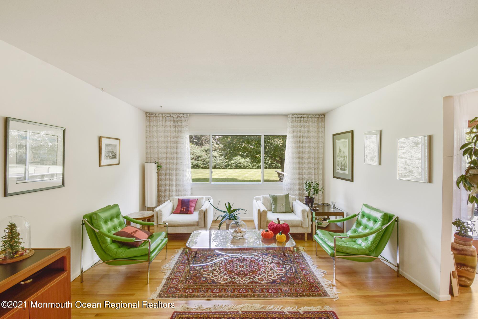 36 Coldspring Road Freehold, NJ 07728 - Photo 7 of 37 a living room with furniture and a rug