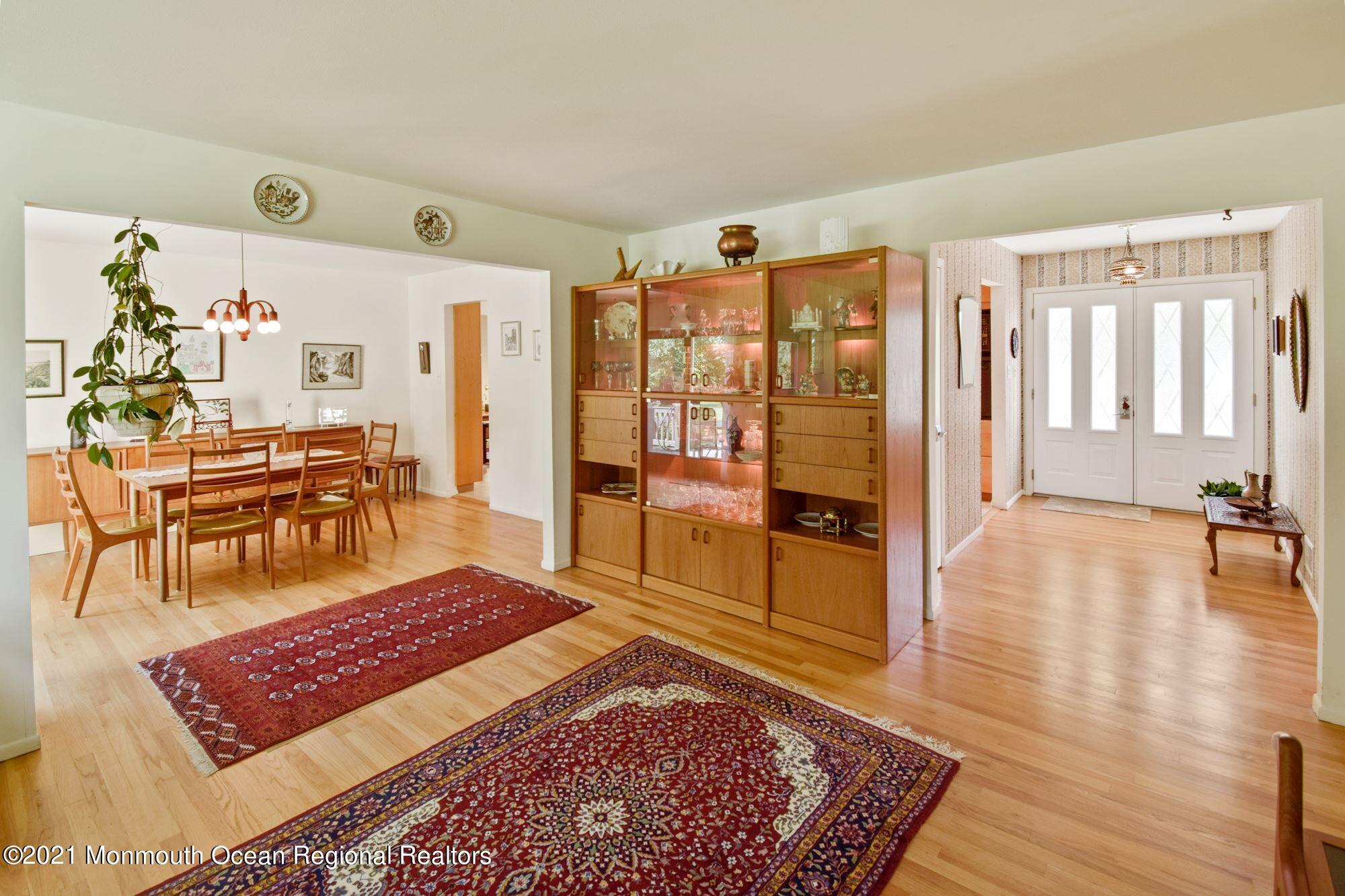 36 Coldspring Road Freehold, NJ 07728 - Photo 10 of 37 a living room with furniture rug and wooden floor