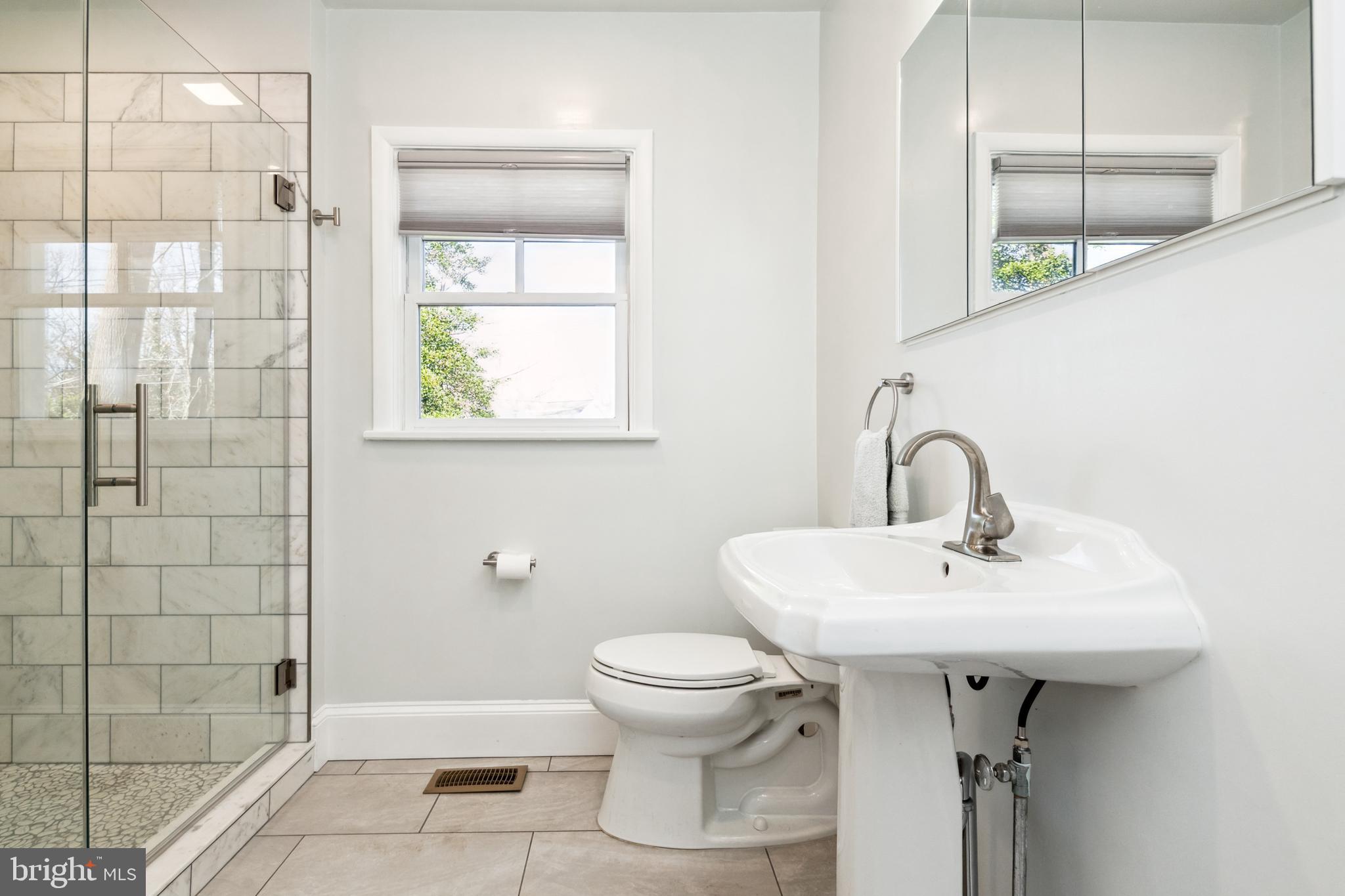 612 Old County Road Severna Park, MD 21146 - Photo 14 of 52 Main Level Full Bath with Custom Tile Shower