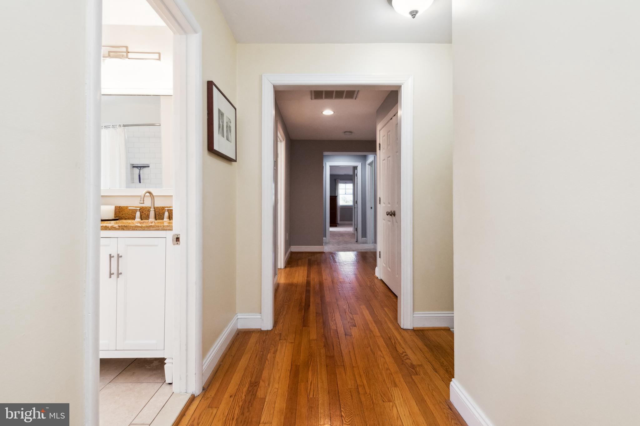 612 Old County Road Severna Park, MD 21146 - Photo 28 of 52 Upper Level Hallway With Bonus Storage Closets