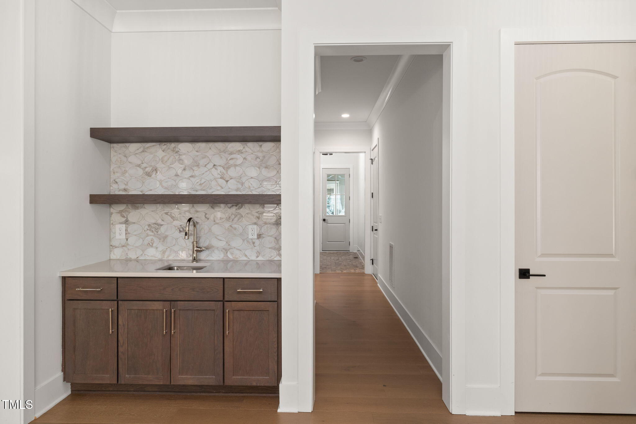1212 Gunnison Place Raleigh, NC 27609 - Photo 23 of 53 a bathroom with a sink and a mirror