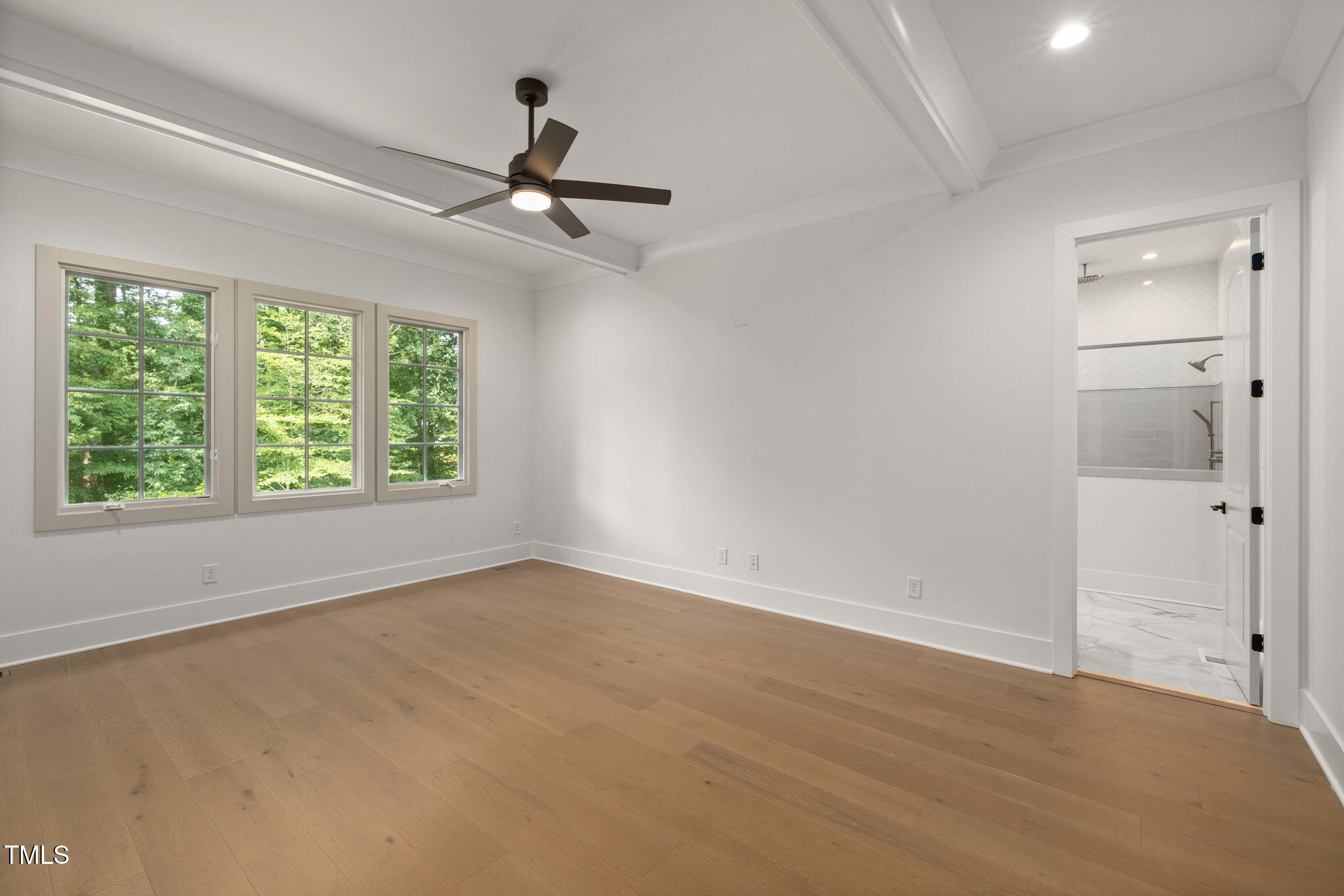 1212 Gunnison Place Raleigh, NC 27609 - Photo 25 of 53 an empty room with windows and closet