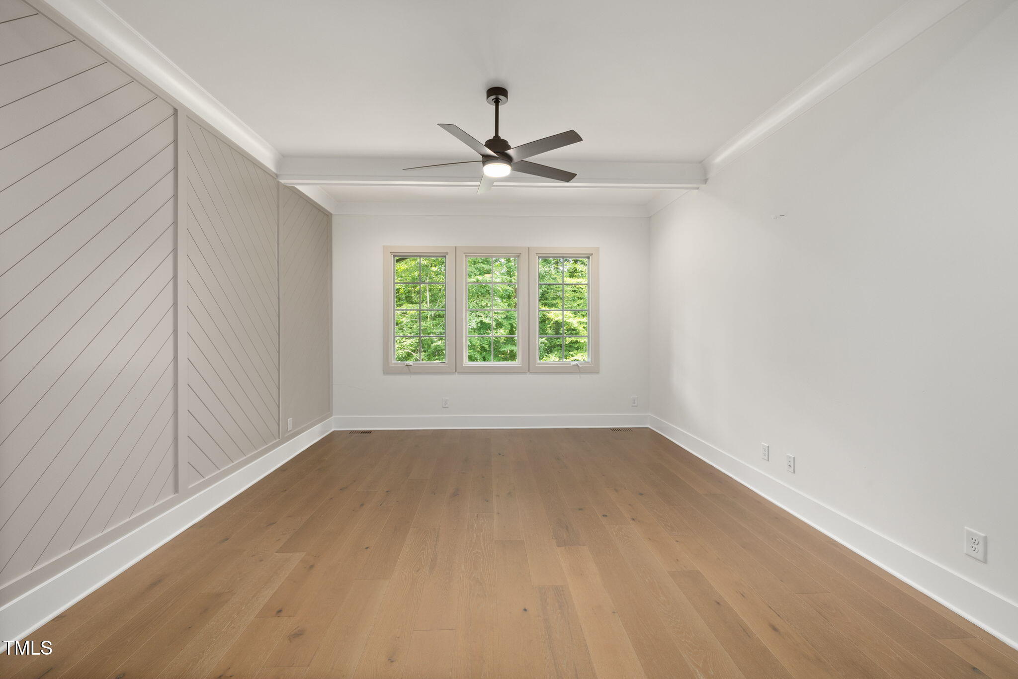 1212 Gunnison Place Raleigh, NC 27609 - Photo 26 of 53 an empty room with windows and ceiling fan