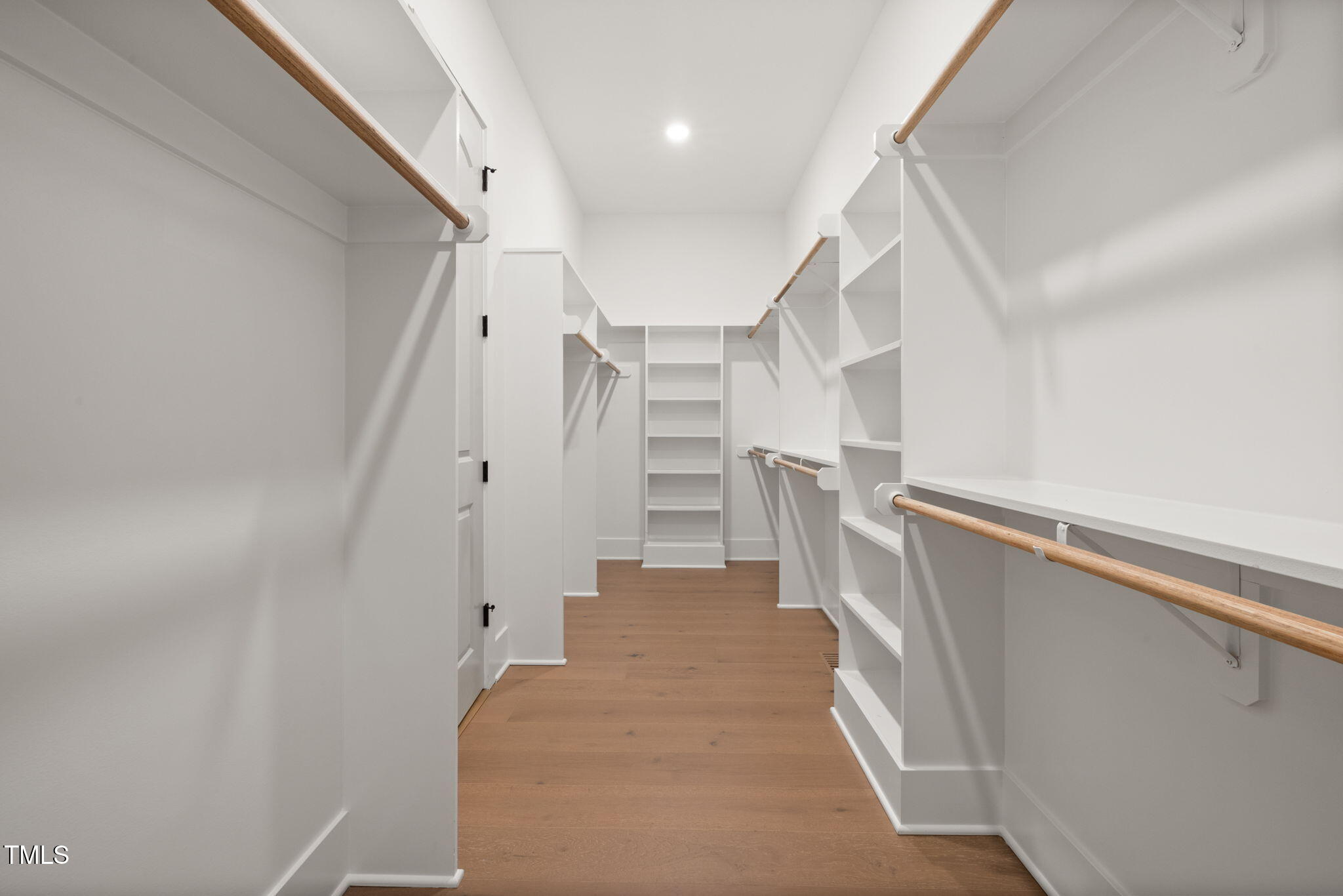 1212 Gunnison Place Raleigh, NC 27609 - Photo 32 of 53 a view of entryway with stairs and wooden floor