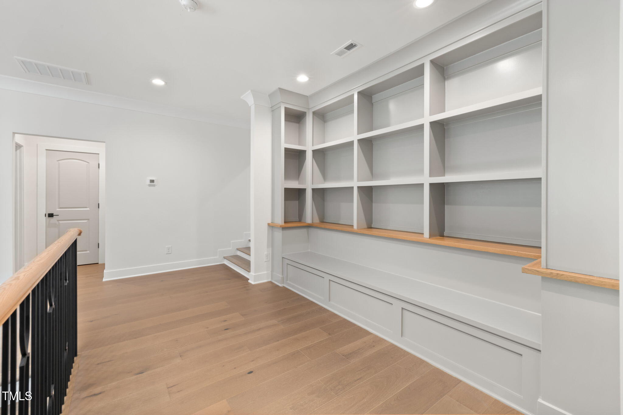 1212 Gunnison Place Raleigh, NC 27609 - Photo 35 of 53 a view of an empty room with empty racks