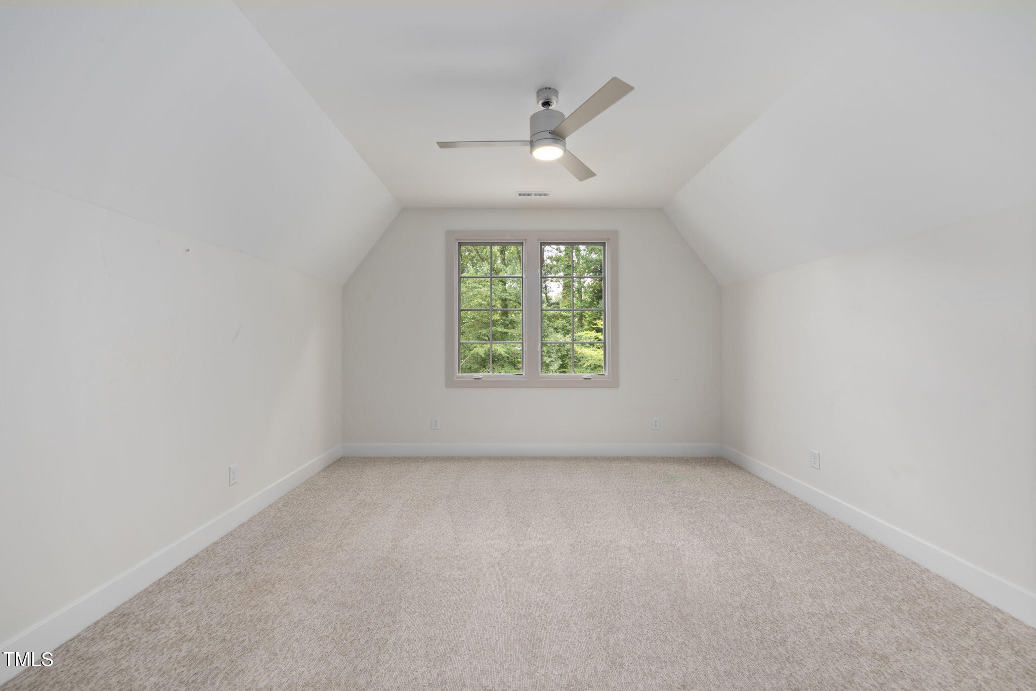 1212 Gunnison Place Raleigh, NC 27609 - Photo 37 of 53 an empty room with a window and a ceiling fan