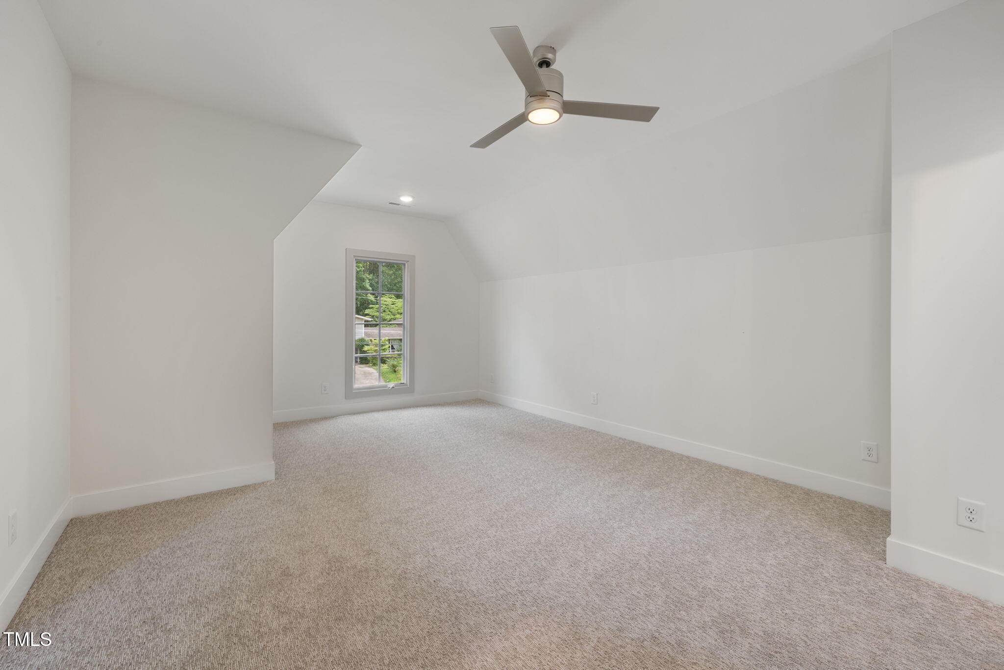 1212 Gunnison Place Raleigh, NC 27609 - Photo 45 of 53 an empty room with windows and fan