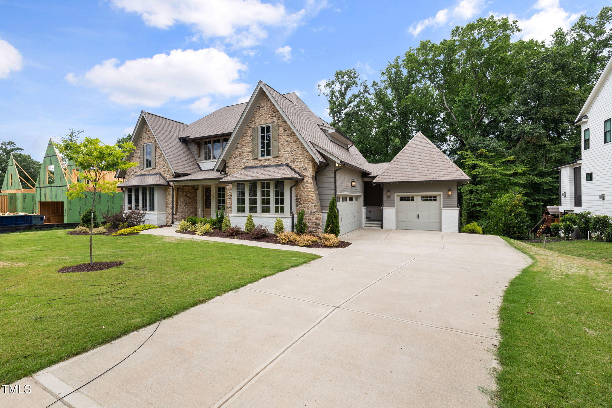 1212 Gunnison Place Raleigh, NC 27609 - Photo 3 of 53 a front view of a house with a yard and porch