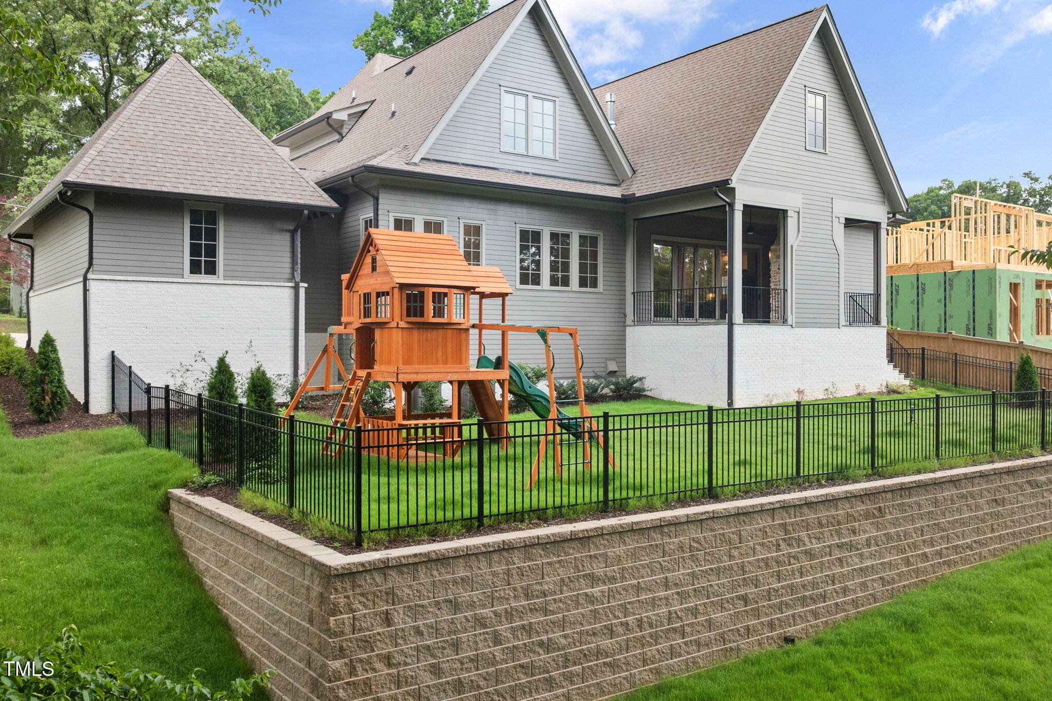 1212 Gunnison Place Raleigh, NC 27609 - Photo 49 of 53 a view of a house with a yard and sitting area