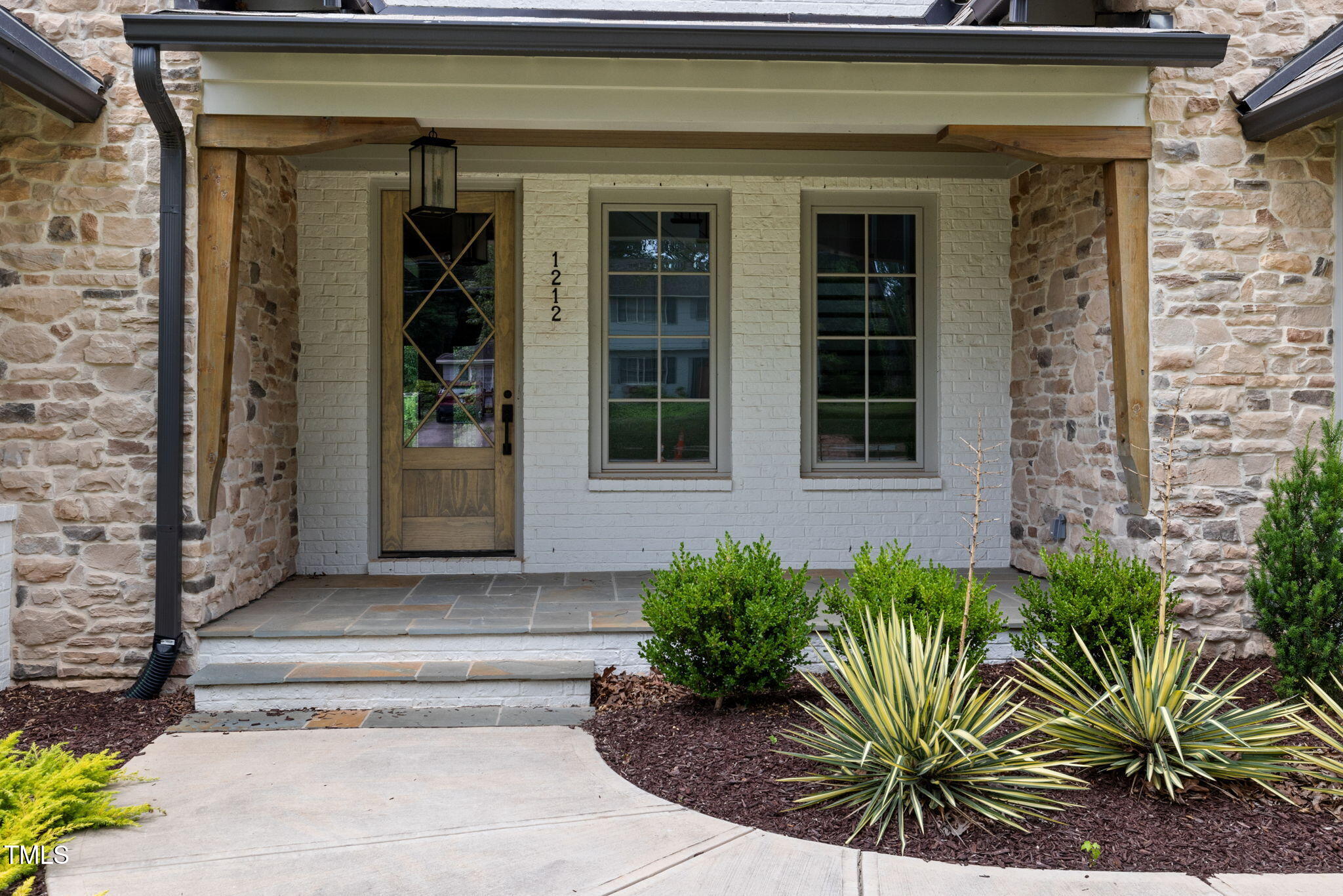 1212 Gunnison Place Raleigh, NC 27609 - Photo 5 of 53 a front view of a house