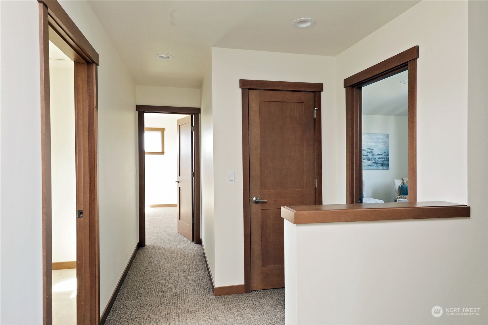 5009 Eagle Ridge Drive Freeland, WA 98249 - Photo 21 of 40 a view of a hallway with closet and mirror