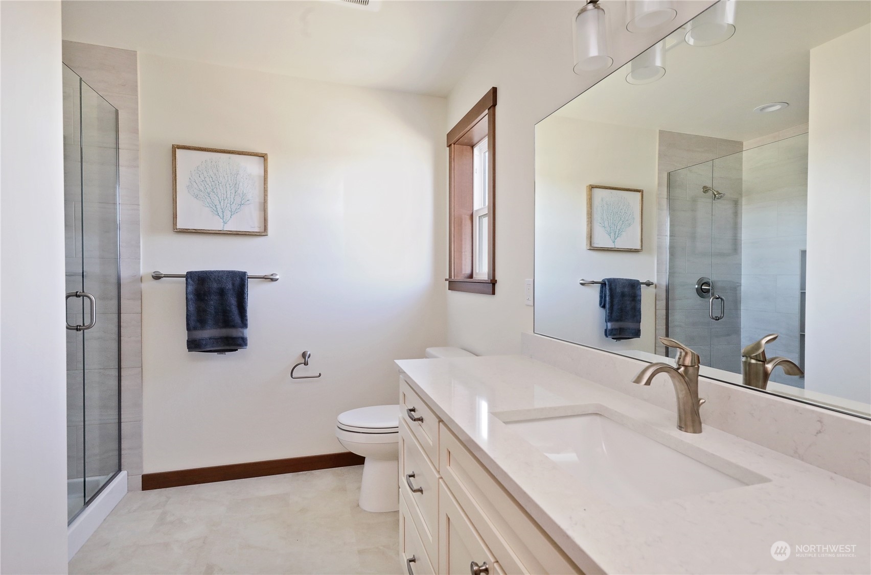 5009 Eagle Ridge Drive Freeland, WA 98249 - Photo 26 of 40 a bathroom with a sink toilet and shower