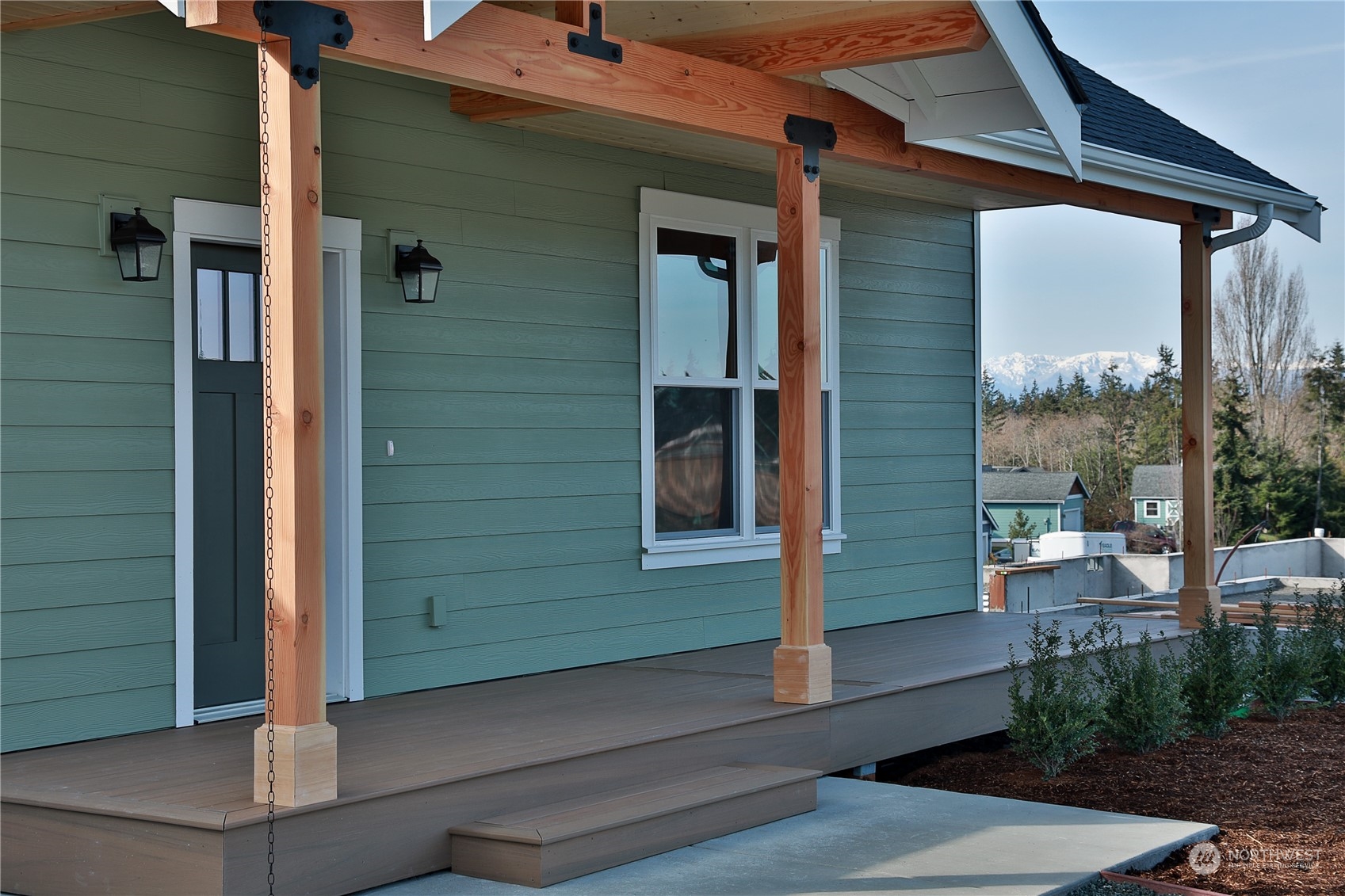 5009 Eagle Ridge Drive Freeland, WA 98249 - Photo 3 of 40 a view of a house with a porch