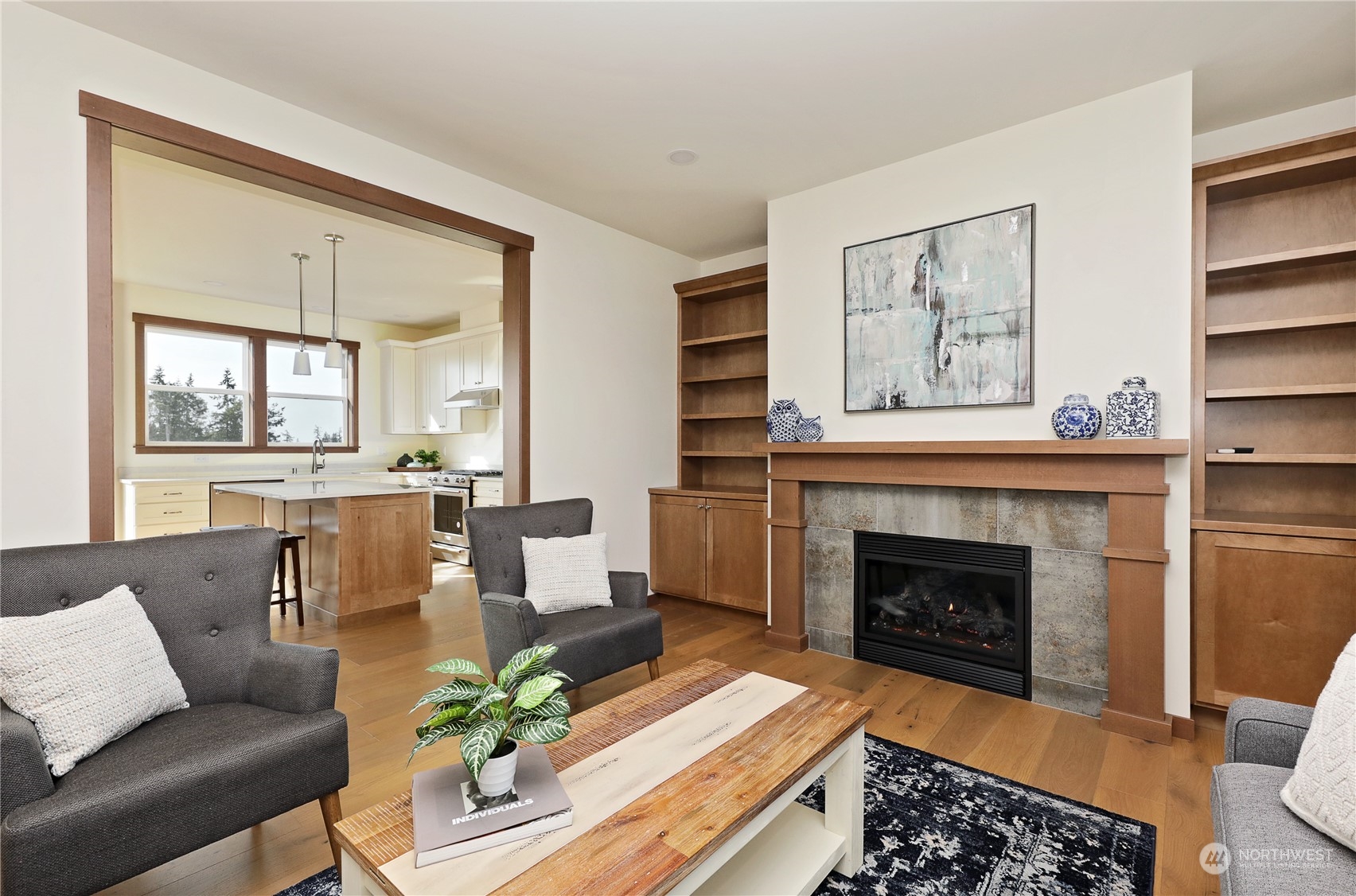 5009 Eagle Ridge Drive Freeland, WA 98249 - Photo 7 of 40 a living room with furniture and a fireplace