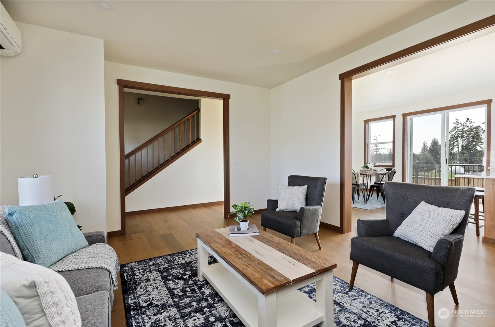 5009 Eagle Ridge Drive Freeland, WA 98249 - Photo 9 of 40 a living room with furniture and a rug