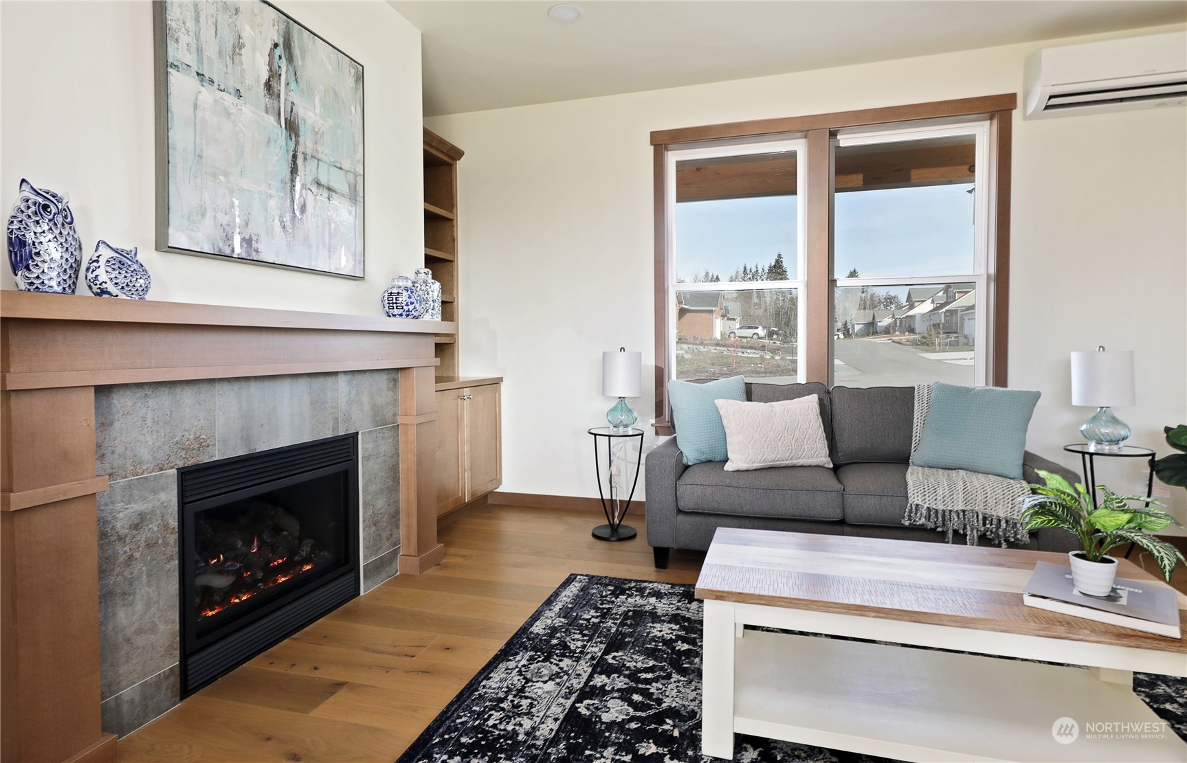 5009 Eagle Ridge Drive Freeland, WA 98249 - Photo 10 of 40 a living room with furniture and a fireplace