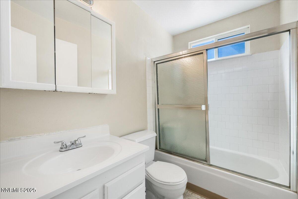 1990 Prior Road Reno, NV 89503 - Photo 14 of 35 a bathroom with a sink toilet and shower