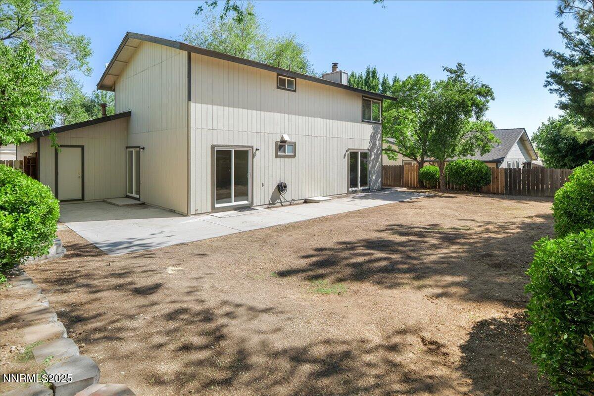 1990 Prior Road Reno, NV 89503 - Photo 30 of 35 a backyard of a house with trees and a barn