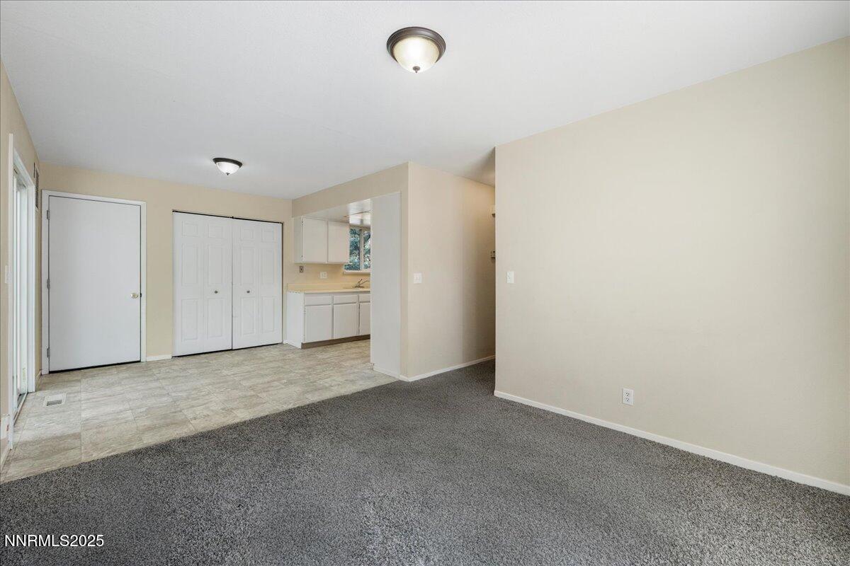 1990 Prior Road Reno, NV 89503 - Photo 9 of 35 a view of an empty room with a kitchen