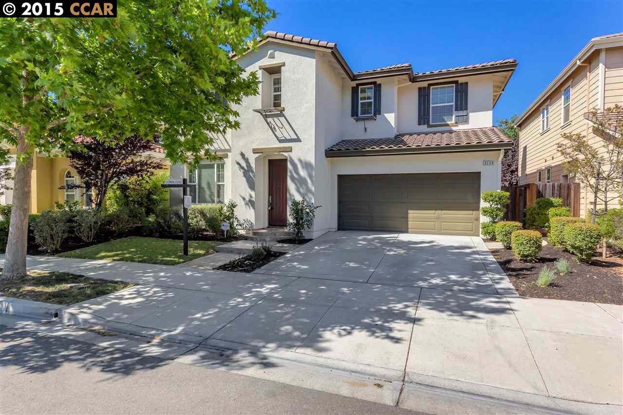 3239 Barons Lane San Ramon, CA 94582 - Photo 1 of 1 a front view of a house with a yard and a garage