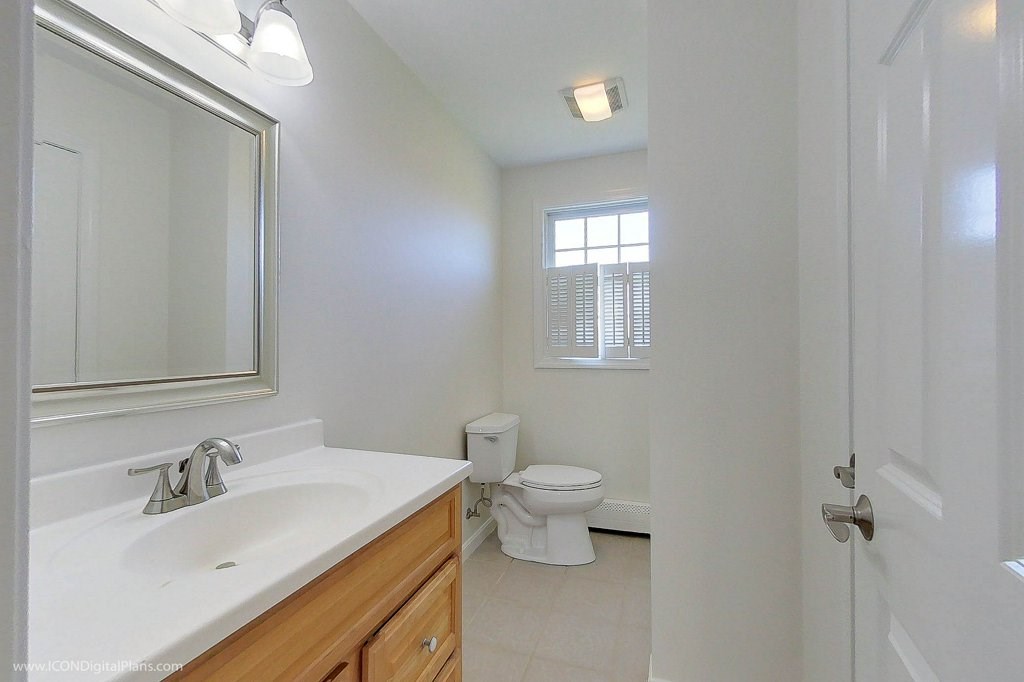 942 Saugatucket Road South Kingstown, RI 02879 - Photo 20 of 39 The master bath offers a tub/shower combination and additional storage in the linen closet, door pictured on the right.