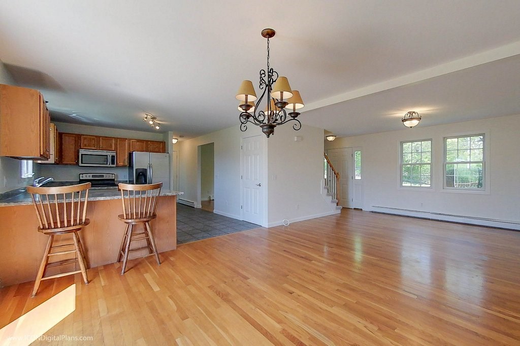 942 Saugatucket Road South Kingstown, RI 02879 - Photo 8 of 39 The living area is open with an easy flow.