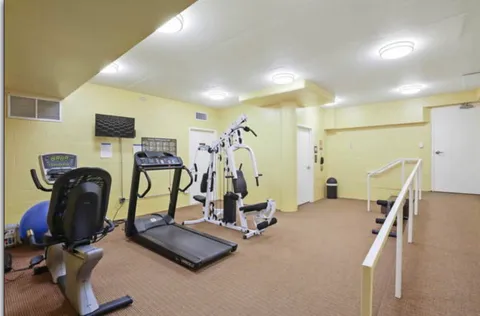a view of a room with gym equipment