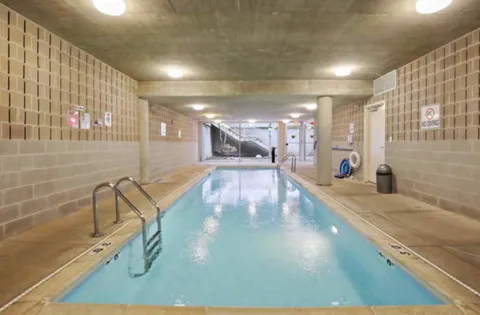 a view of a living room and bathroom