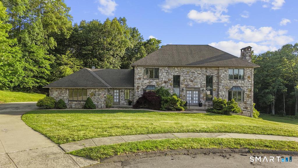 49 Partridge Lane Middletown, CT 06457 - Photo 2 of 39 a front view of house with yard and green space