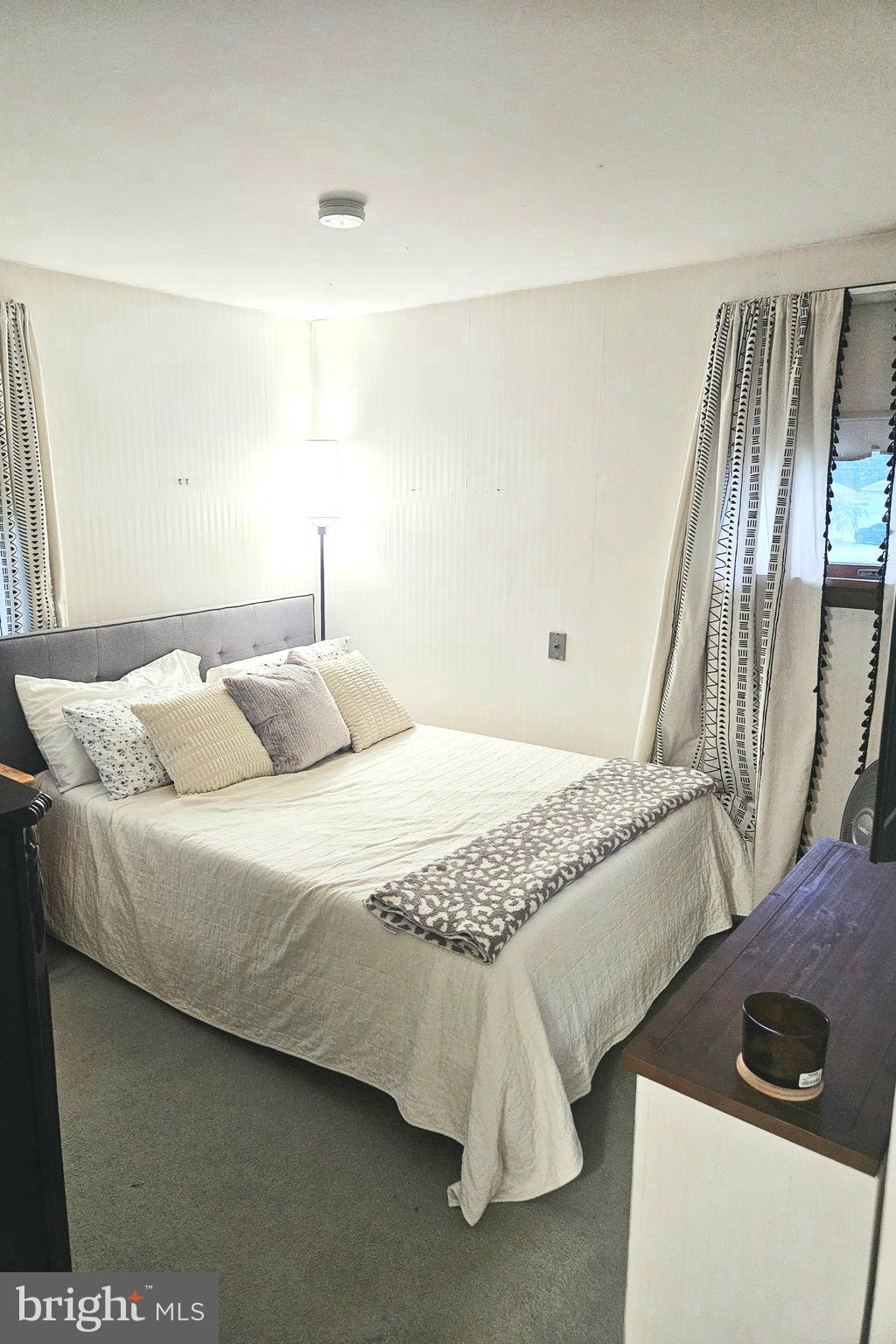 228 Somerset Road Deptford, NJ 08096 - Photo 10 of 17 a bedroom with a bed and wooden floor