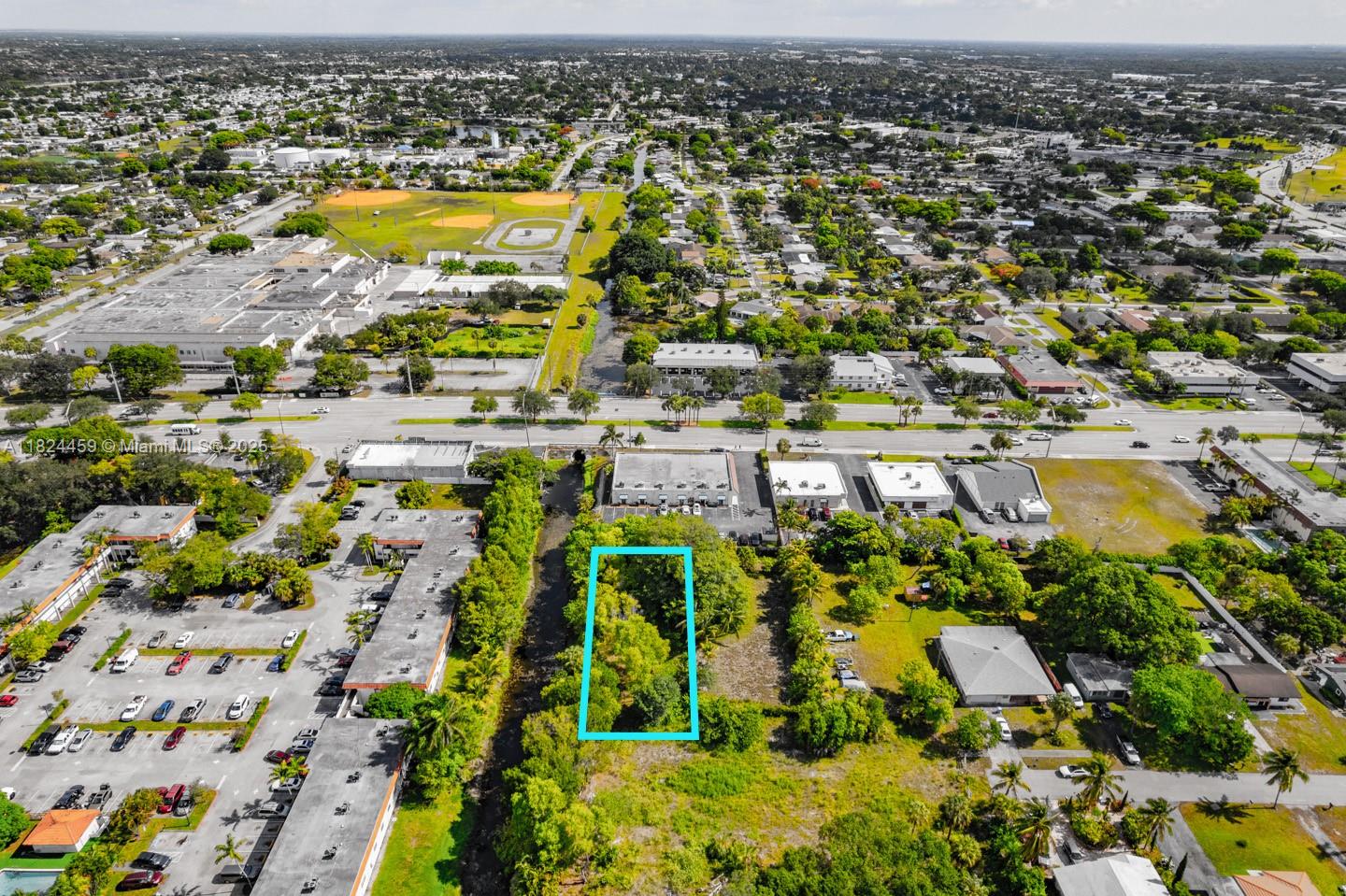 6214 Edwards Road Pompano Beach, FL 33063 - Photo 13 of 41 an aerial view of residential houses with outdoor space