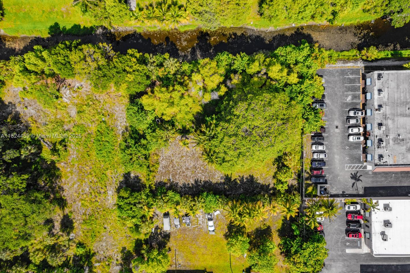 6214 Edwards Road Pompano Beach, FL 33063 - Photo 20 of 41 a view of a garden with plants